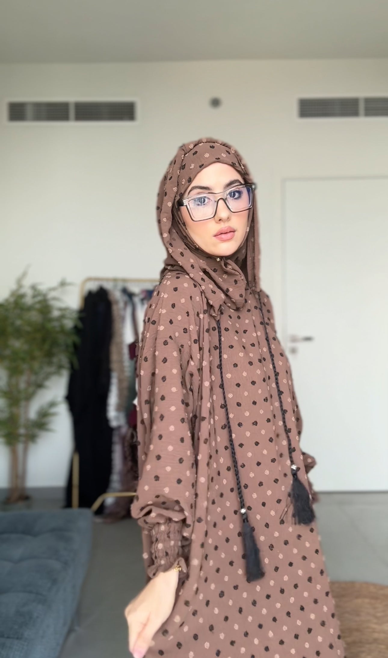 Brown burqa with black dots