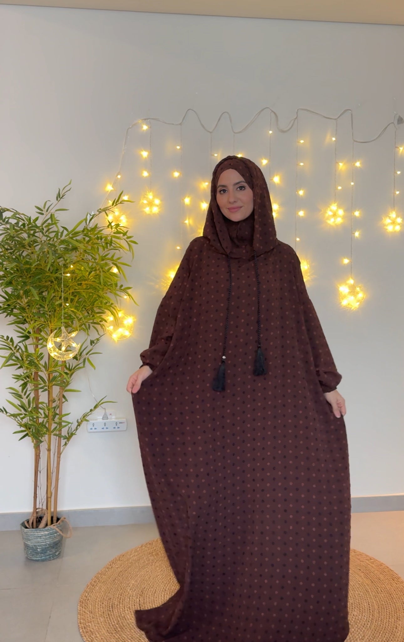 Dark brown burqa with black dots