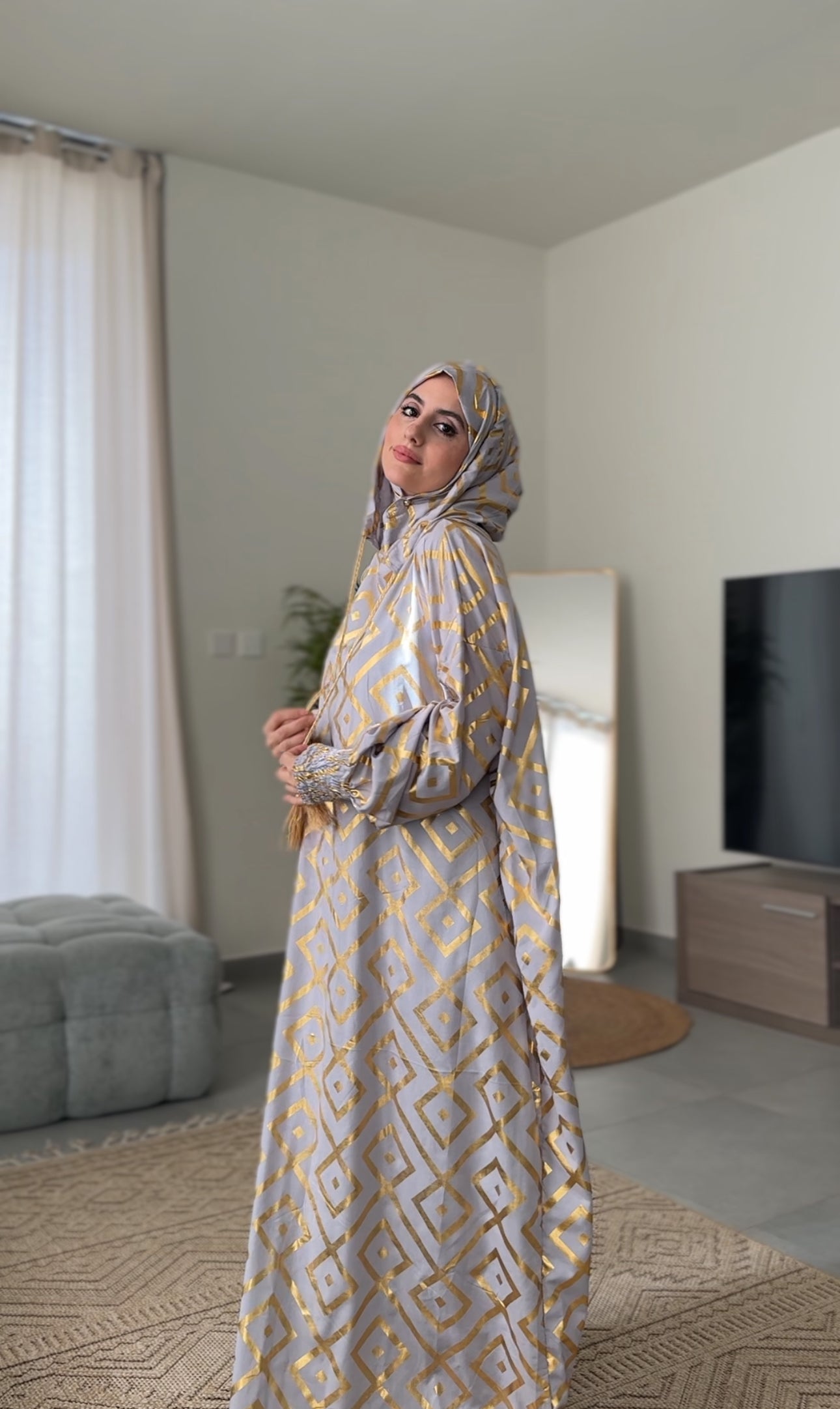 Light grey burqa with gold geometric lines