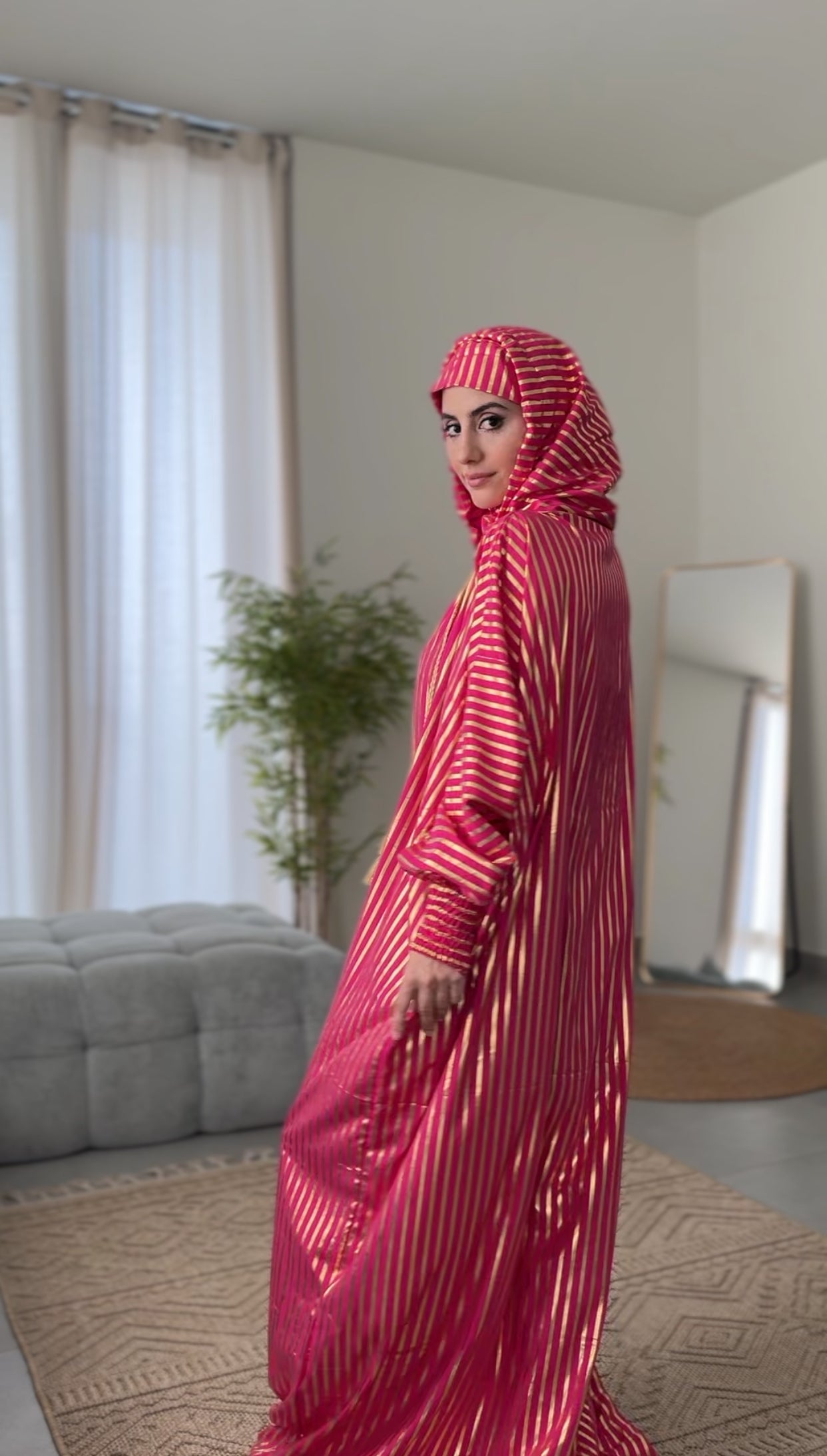 Fuchsia pink burqa with thick gold vertical lines