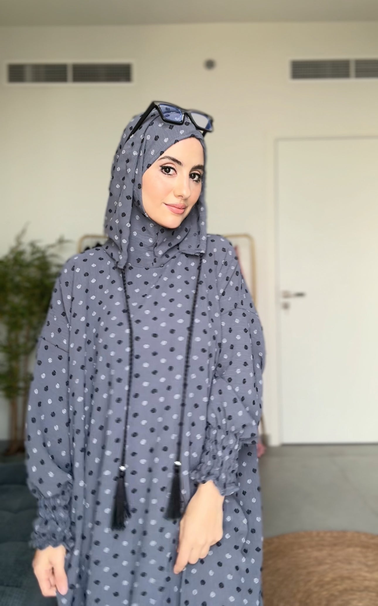 Gray burqa with black dots