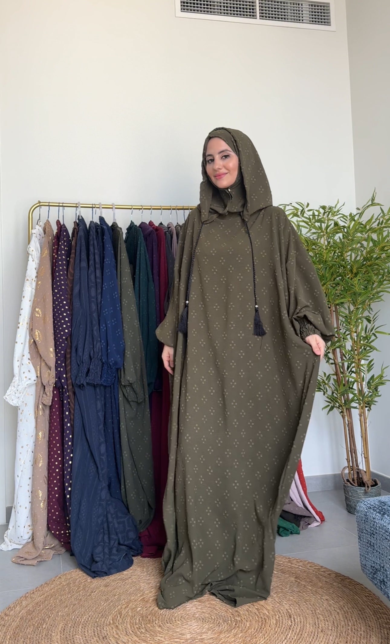 Olive green burqa with four dots