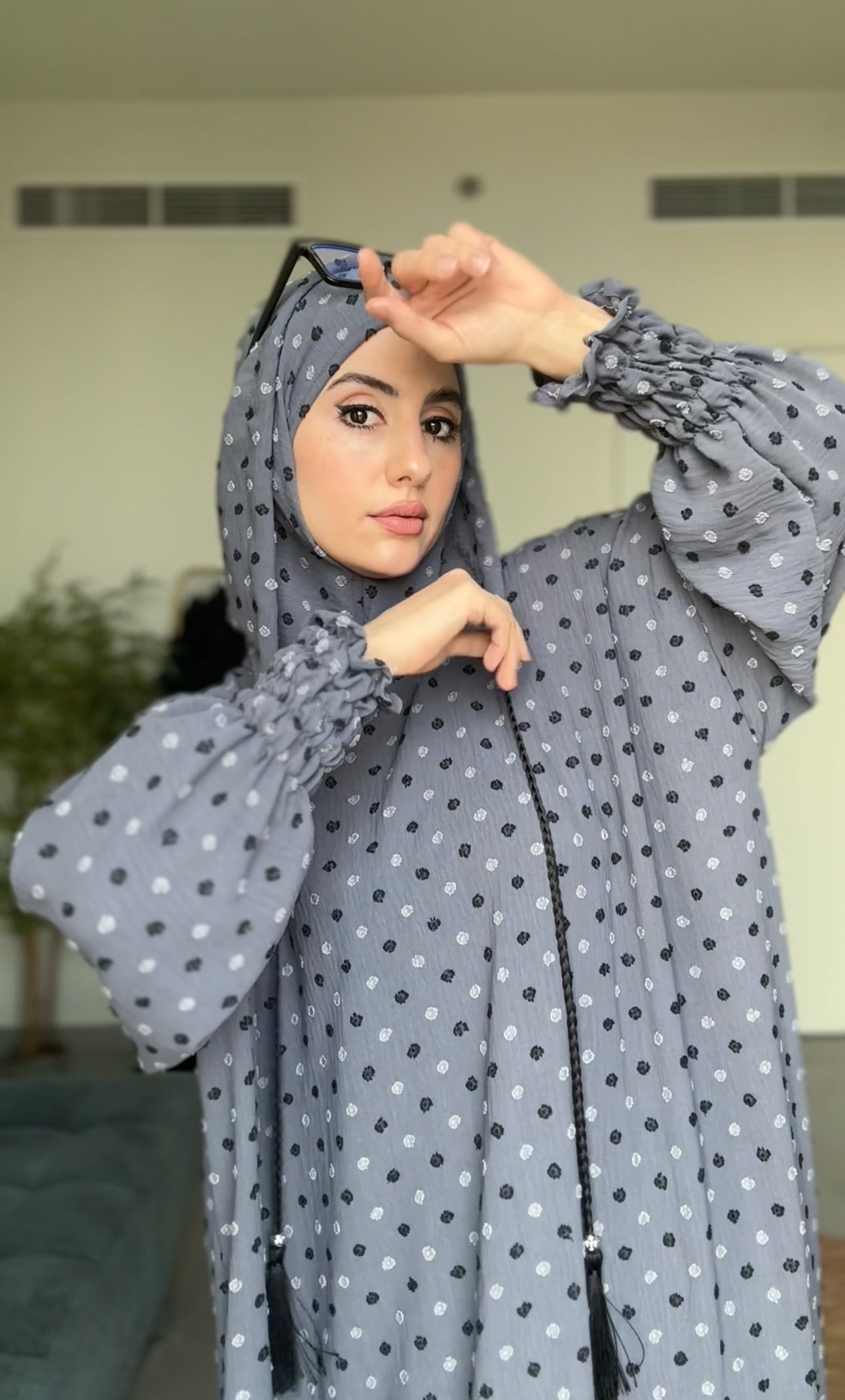 Gray burqa with black dots