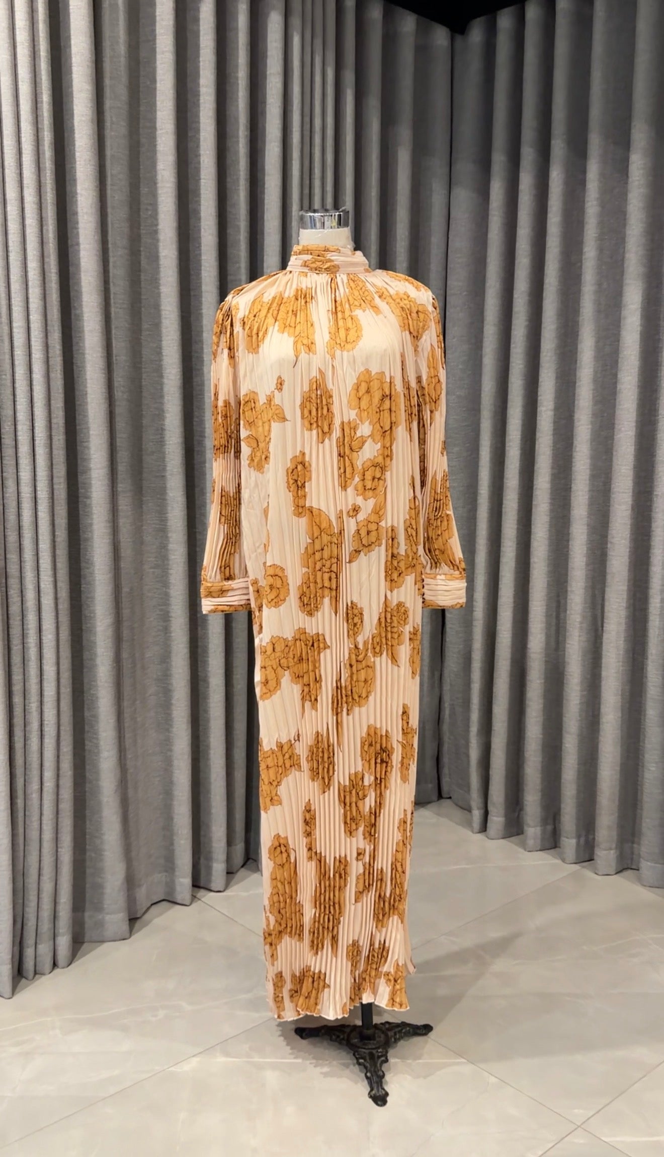 Yellow pleated dress