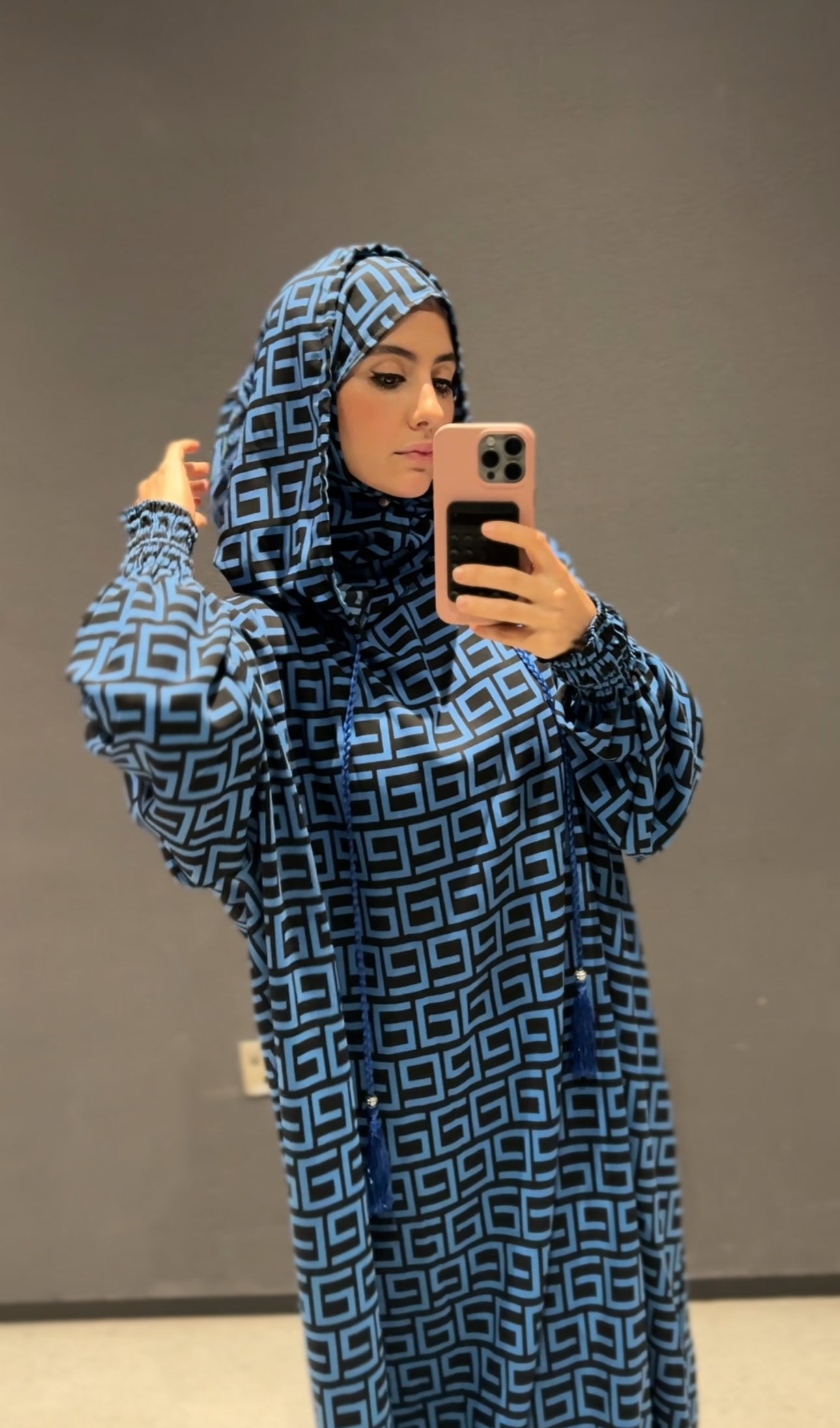 Blue burqa with black geometric lines