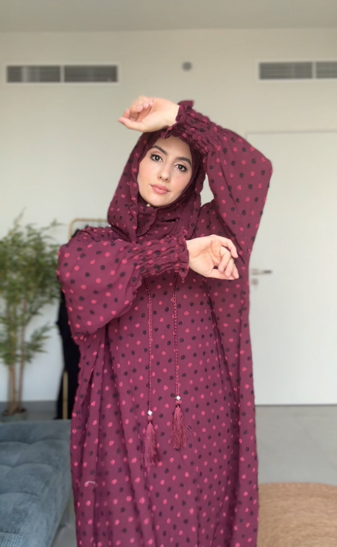 Maroon burqa with black dots