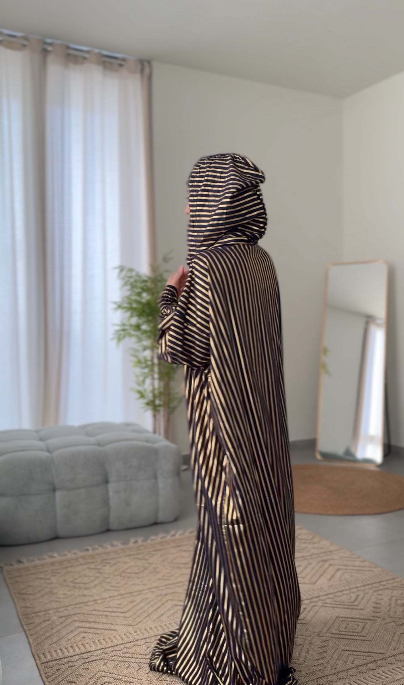 Dark navy burqa with thick gold vertical lines