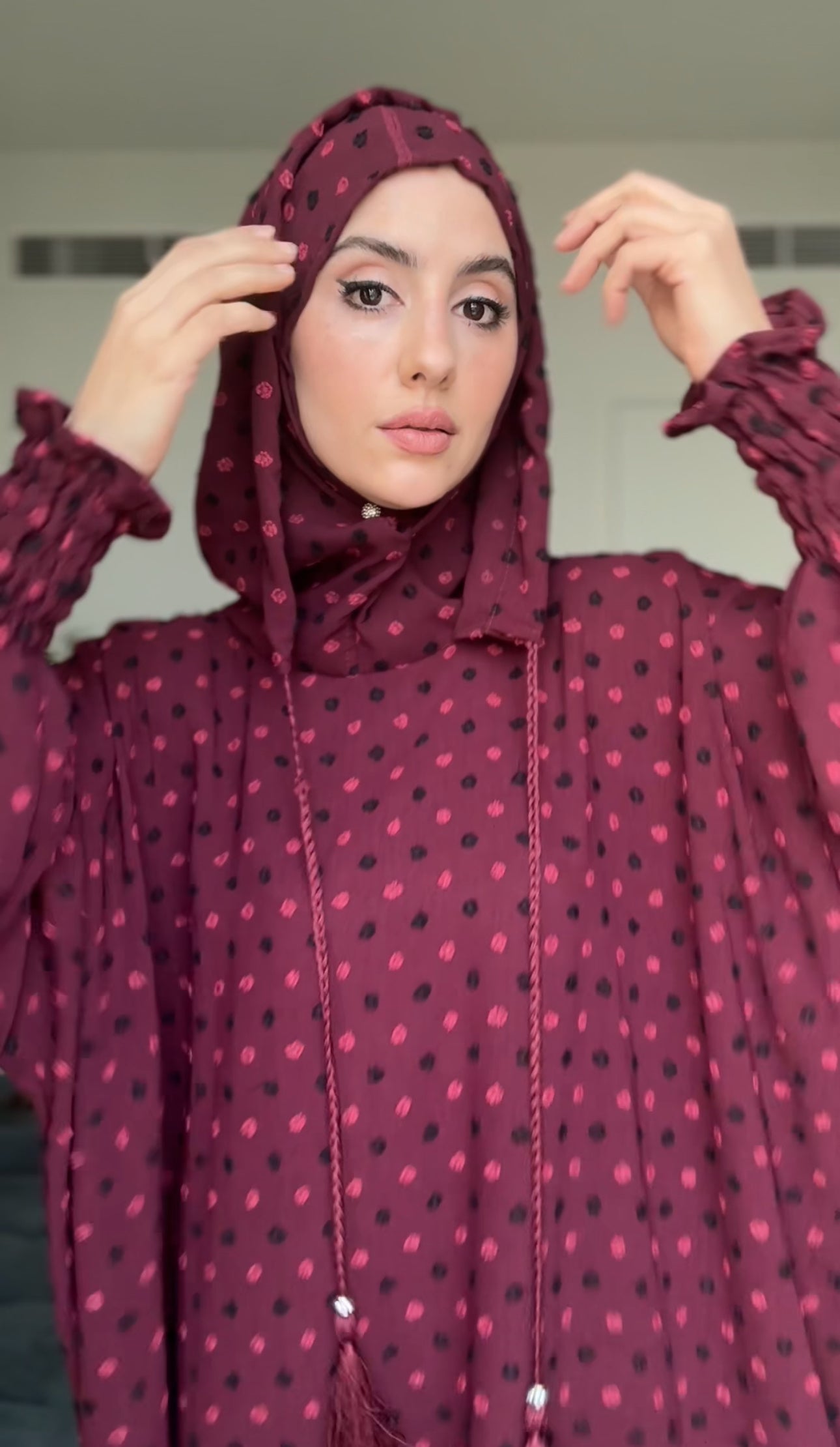 Maroon burqa with black dots