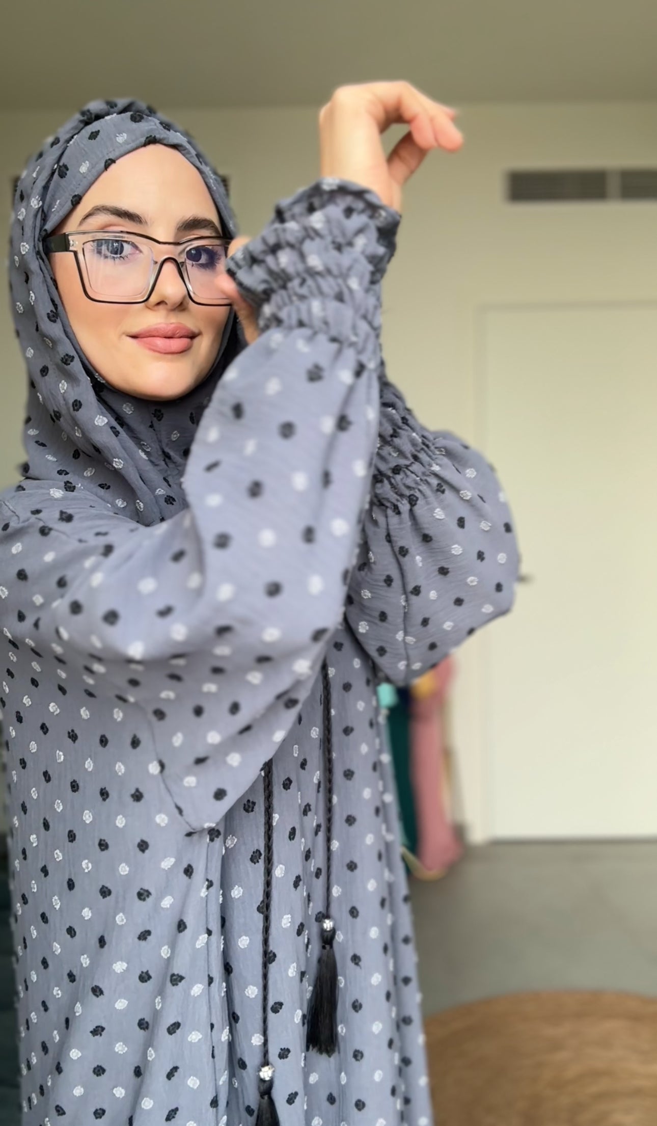 Gray burqa with black dots