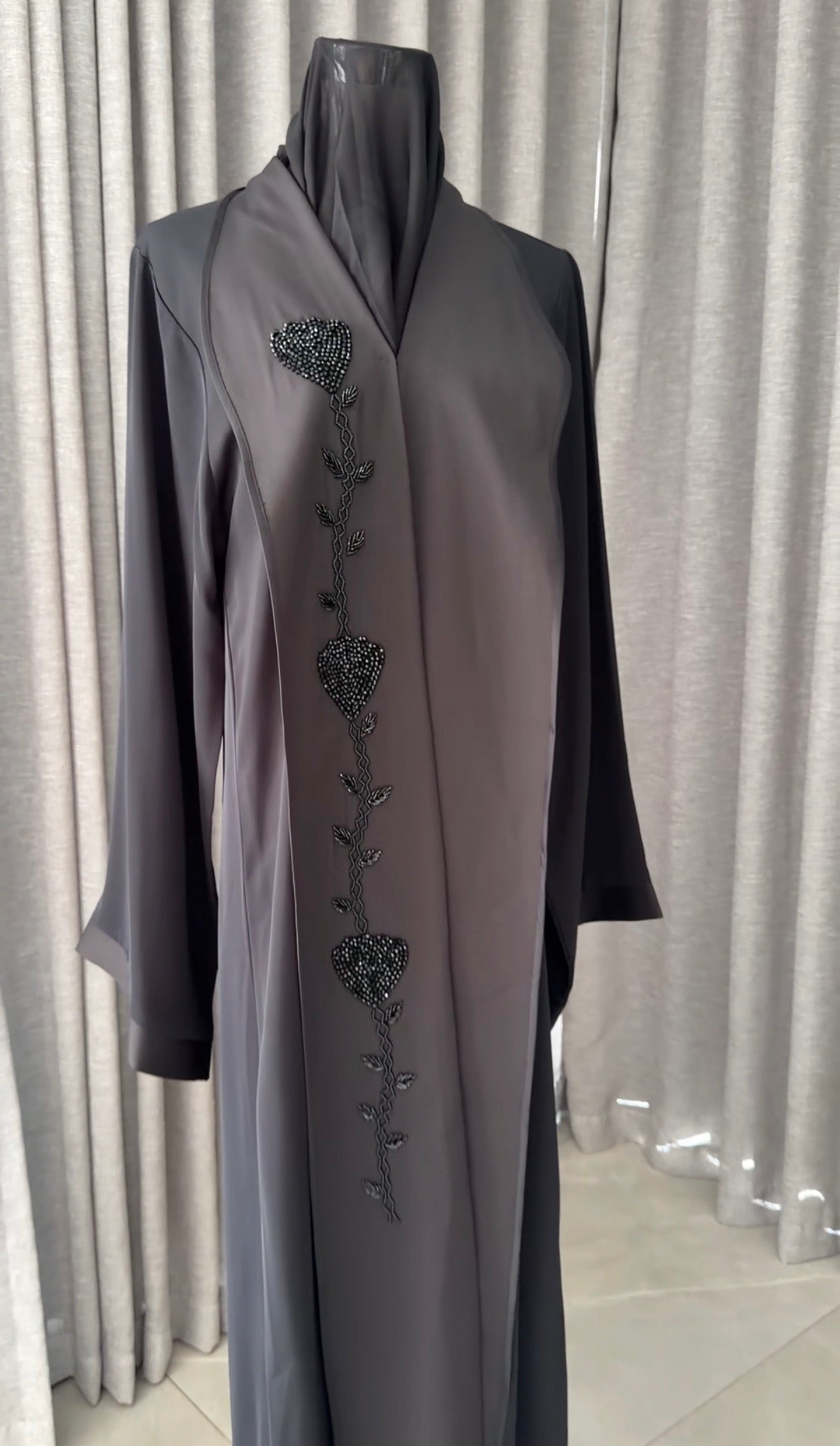 Black abayah with black beadwork detail