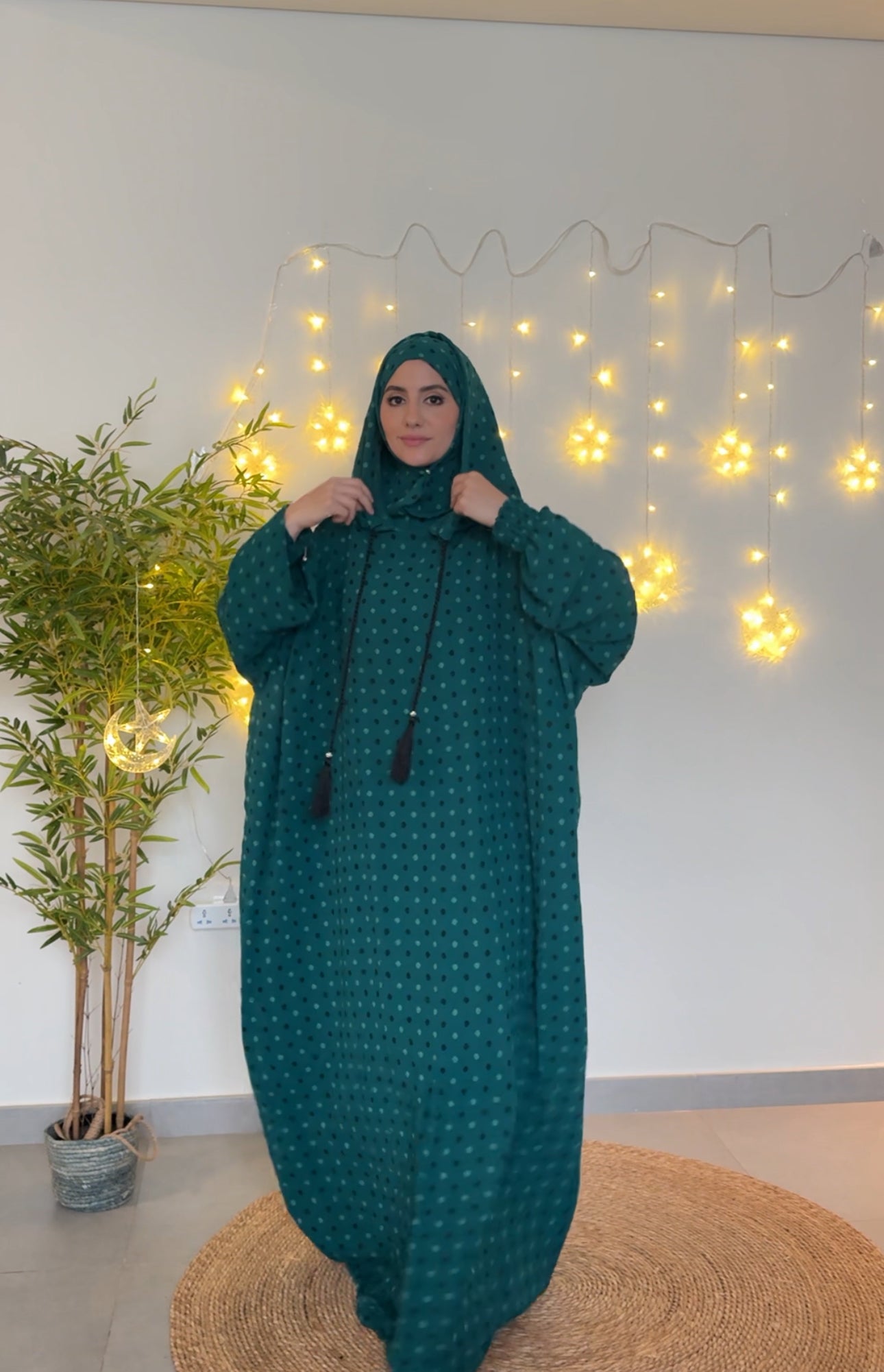 Emerald green burqa with black dots