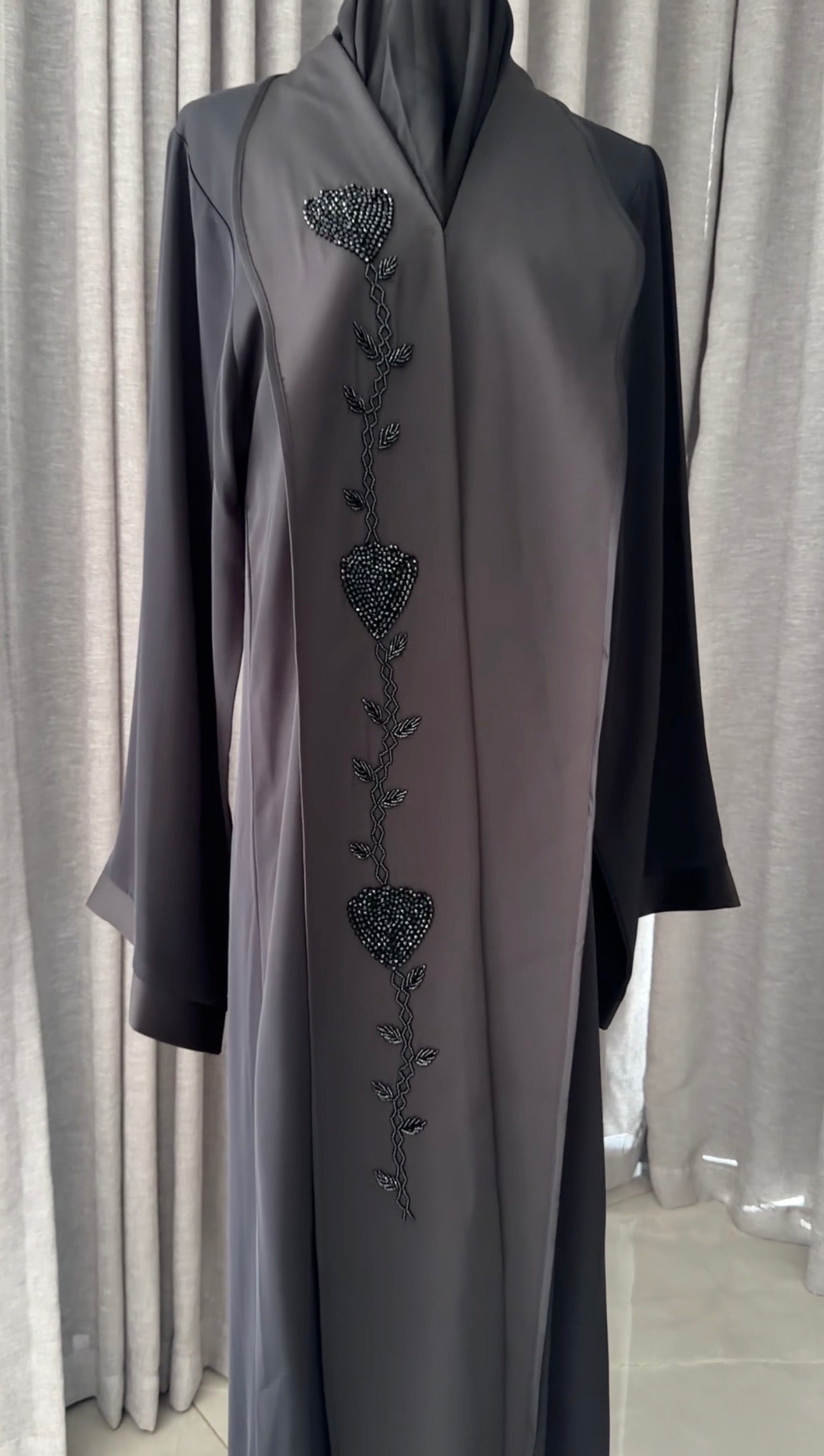 Black abayah with black beadwork detail