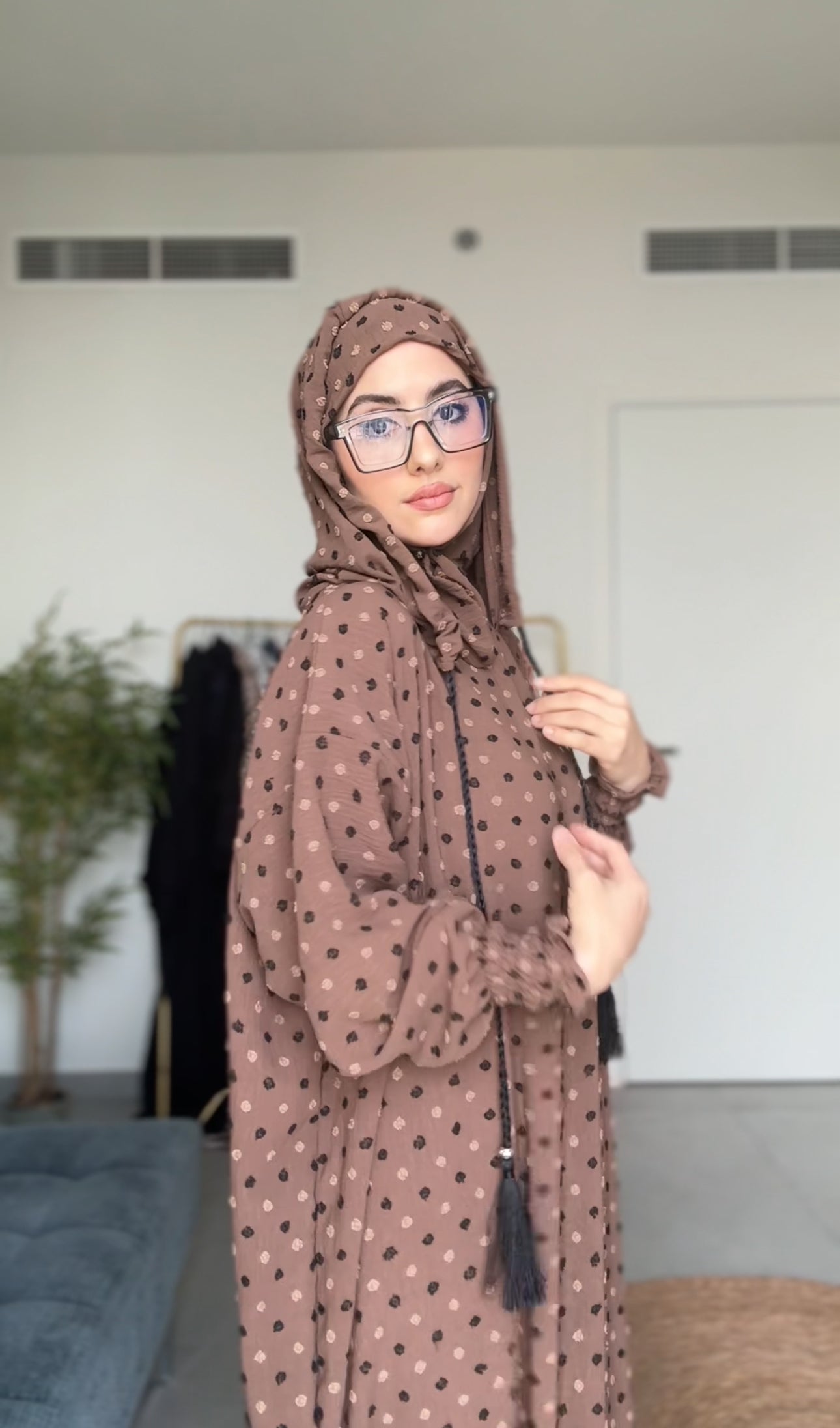 Brown burqa with black dots