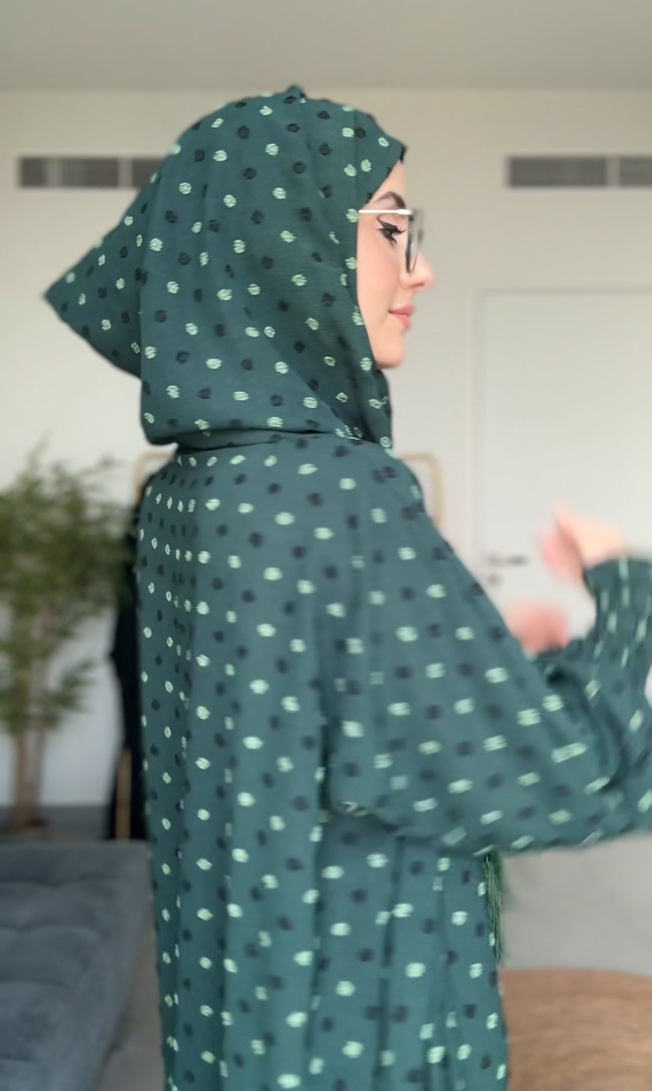 Emerald green burqa with black dots