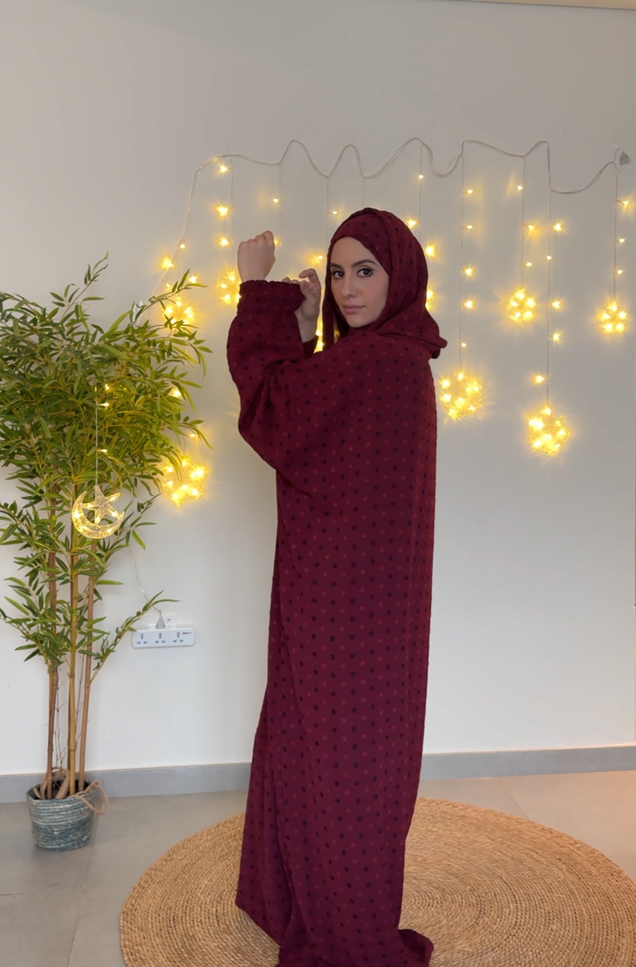 Maroon burqa with black dots