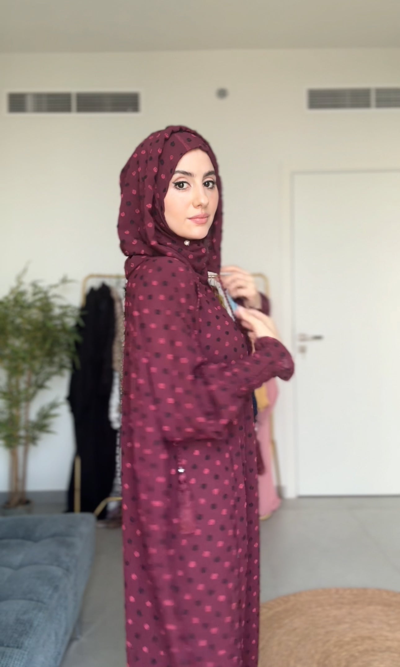 Maroon burqa with black dots