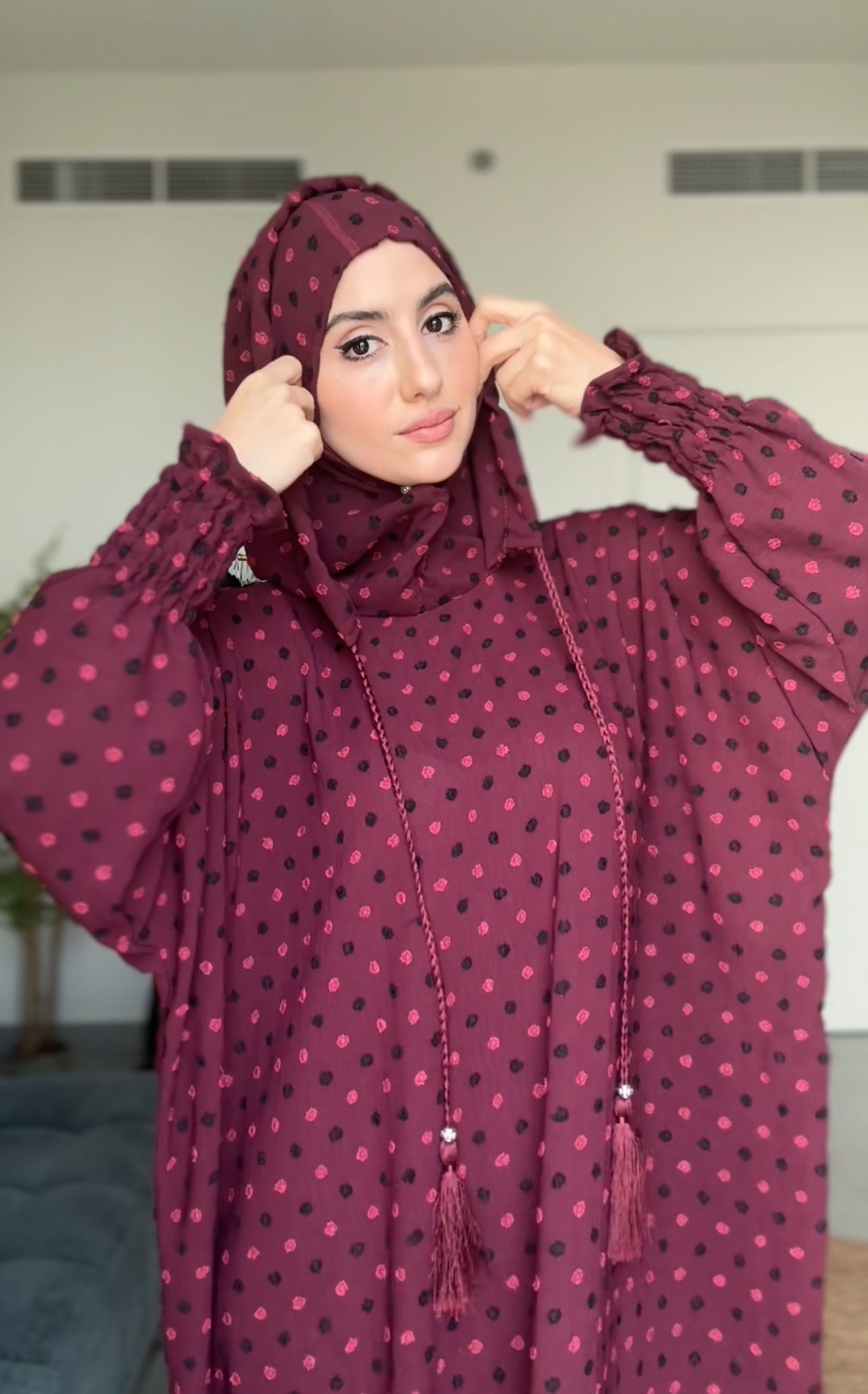 Maroon burqa with black dots