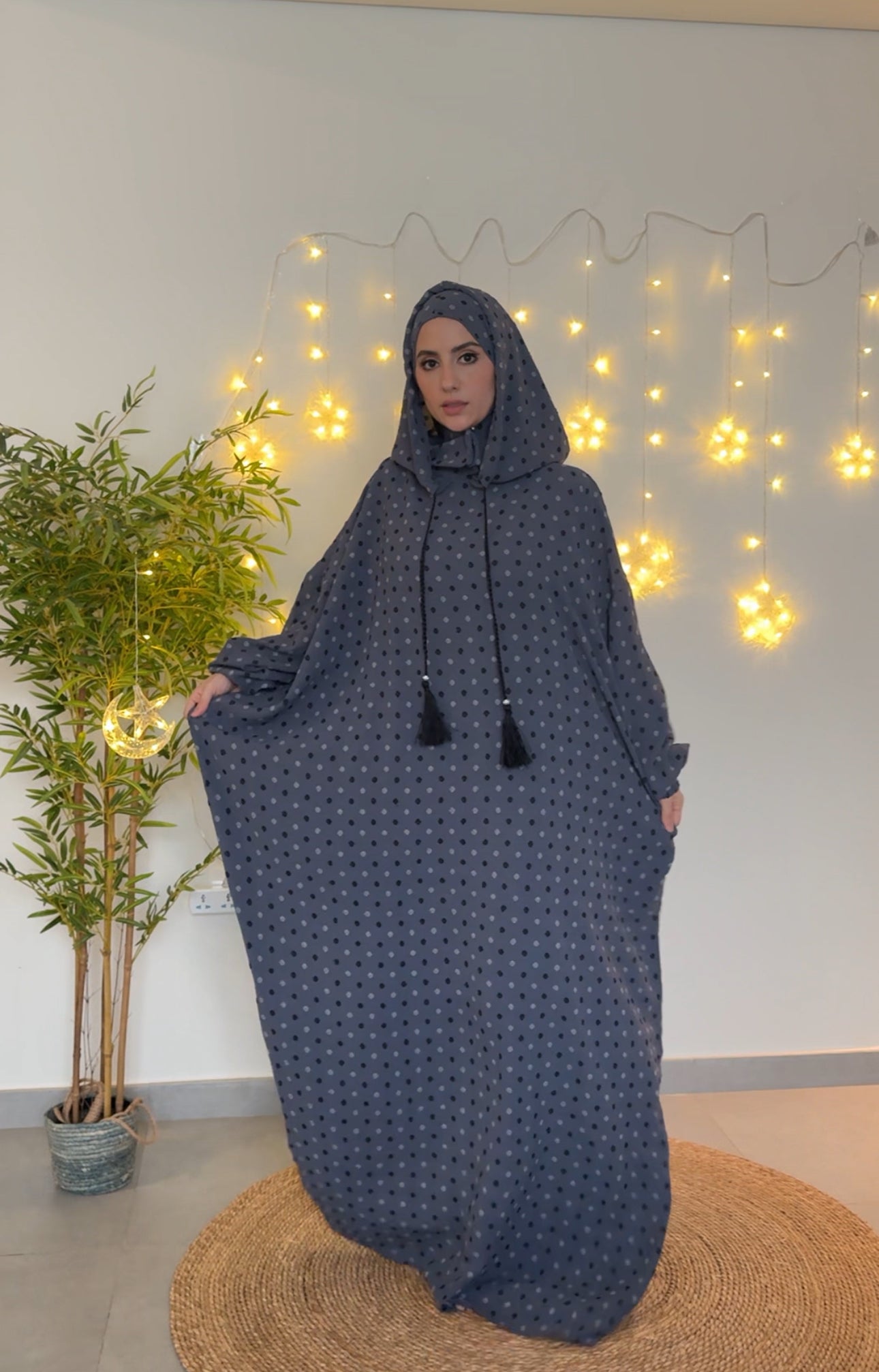 Gray burqa with black dots