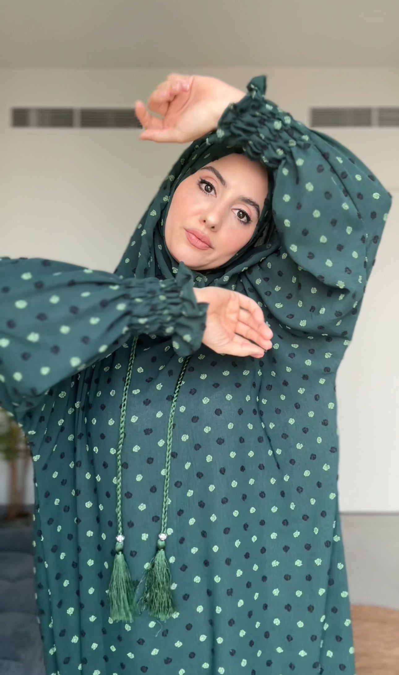 Emerald green burqa with black dots