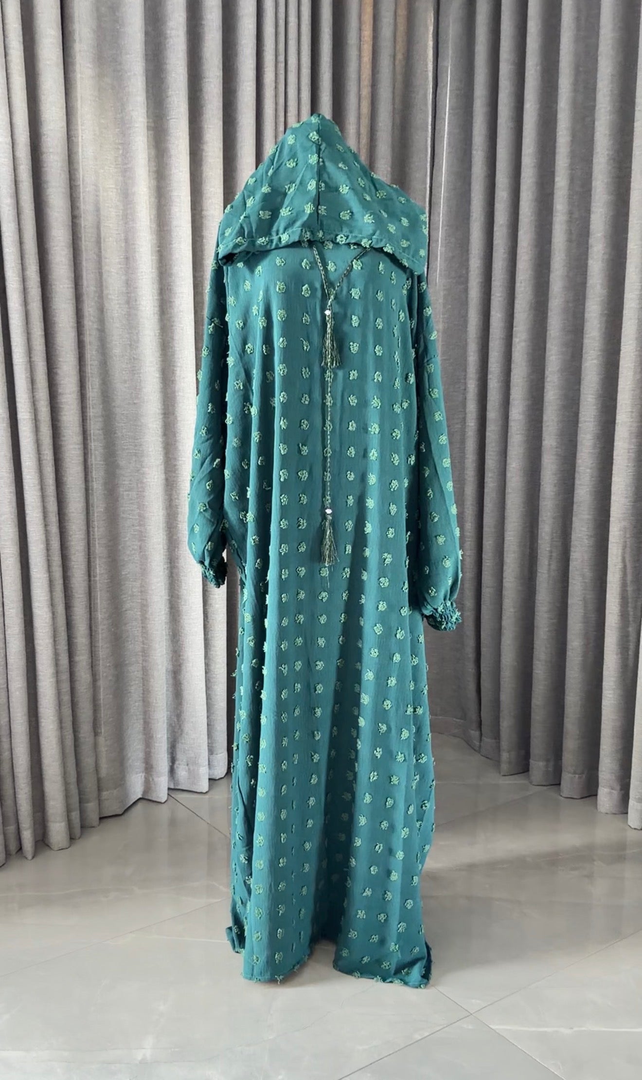 Dark green burqa with big dots