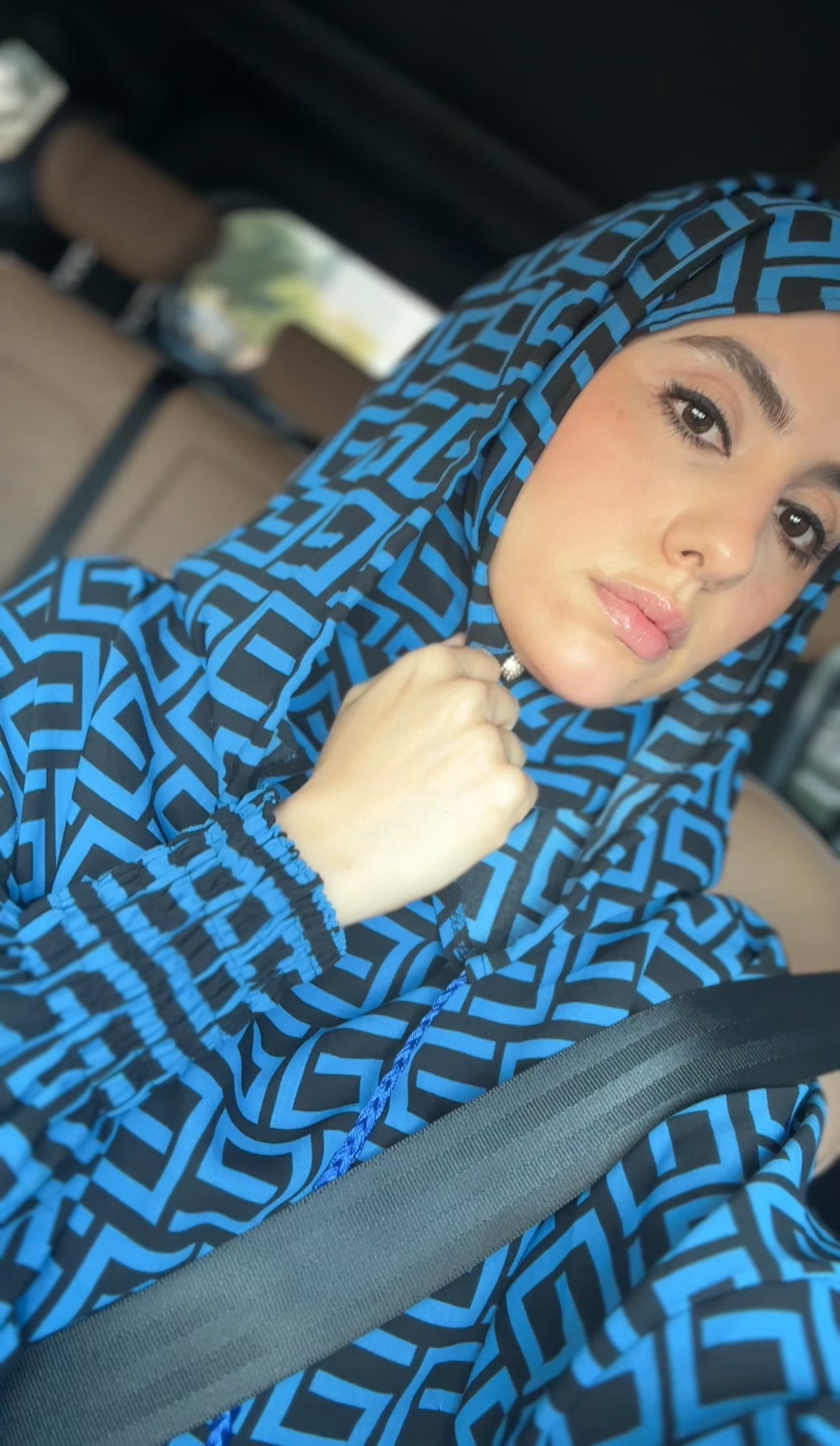 Blue burqa with black geometric lines