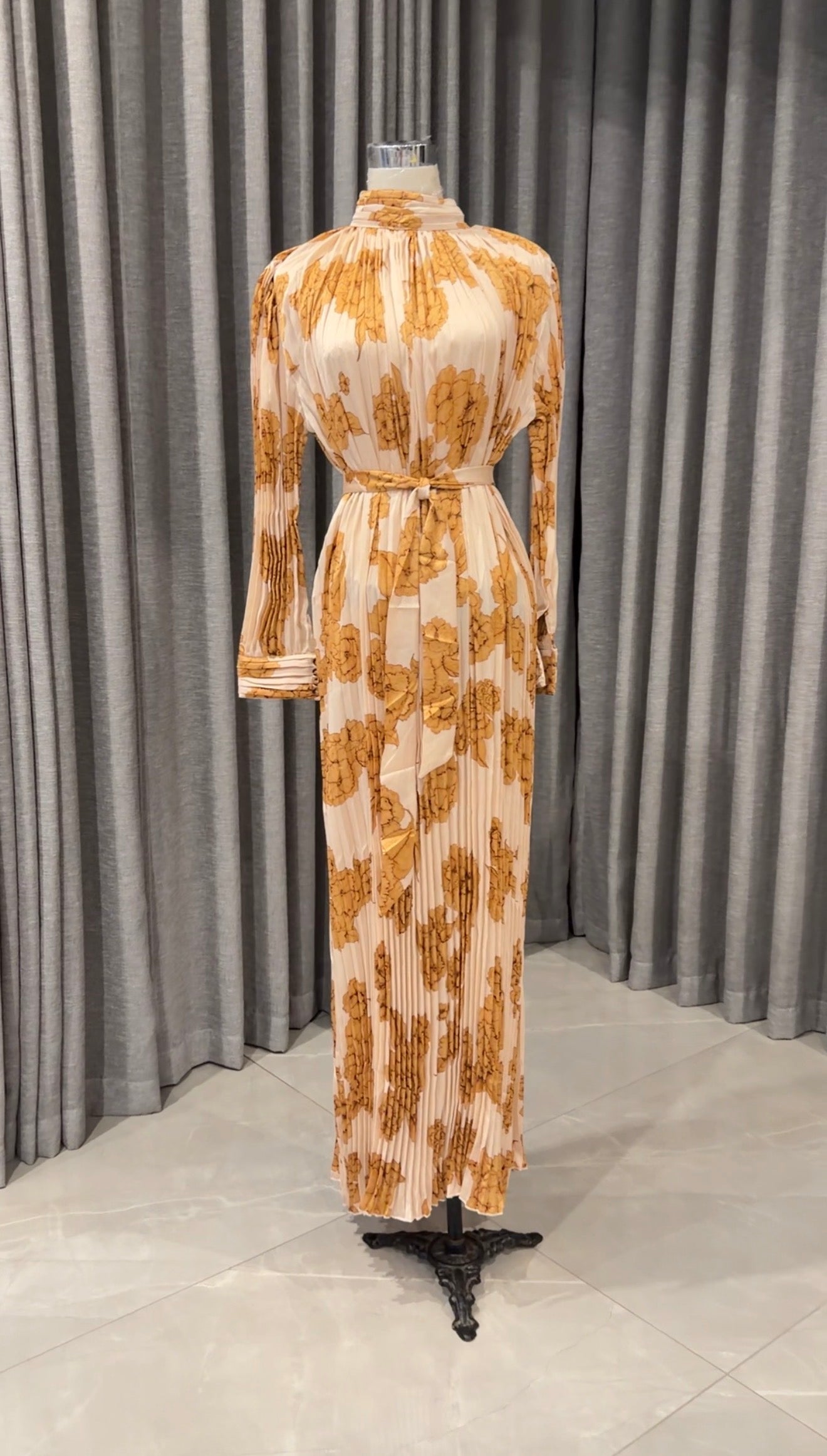 Yellow pleated dress