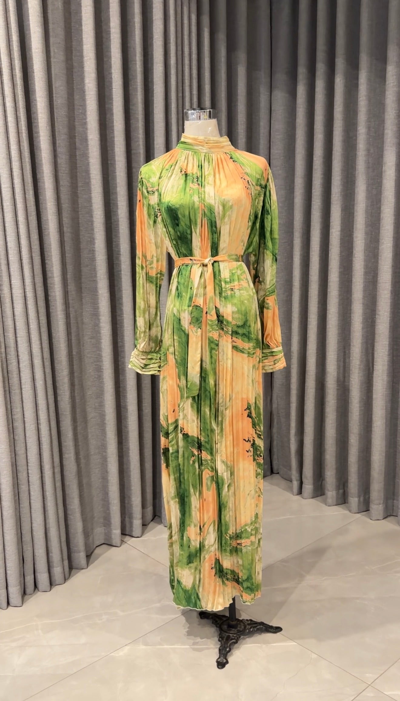 Green and yellow pleated dress