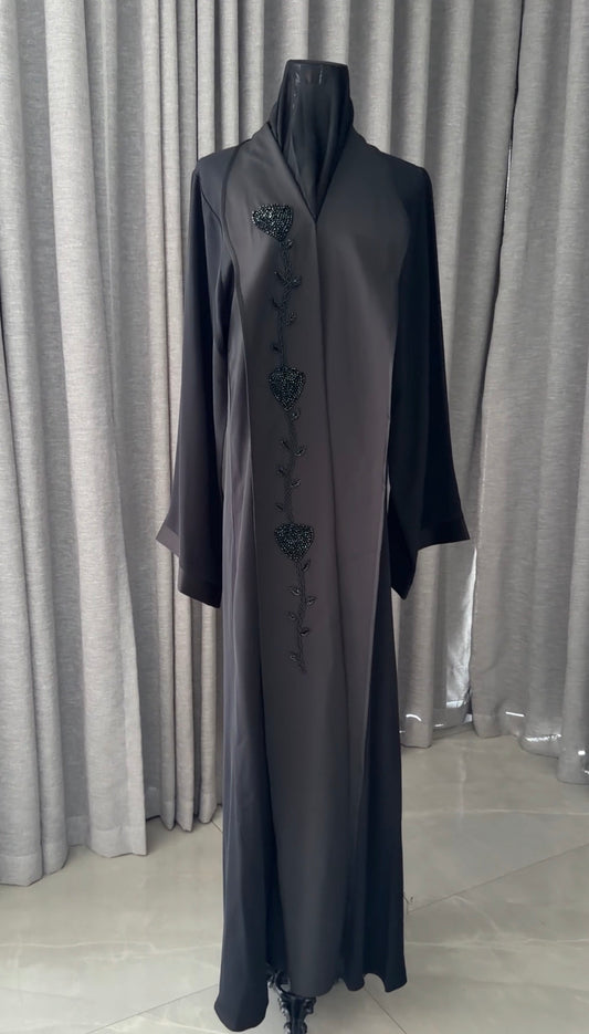 Black abayah with black beadwork detail