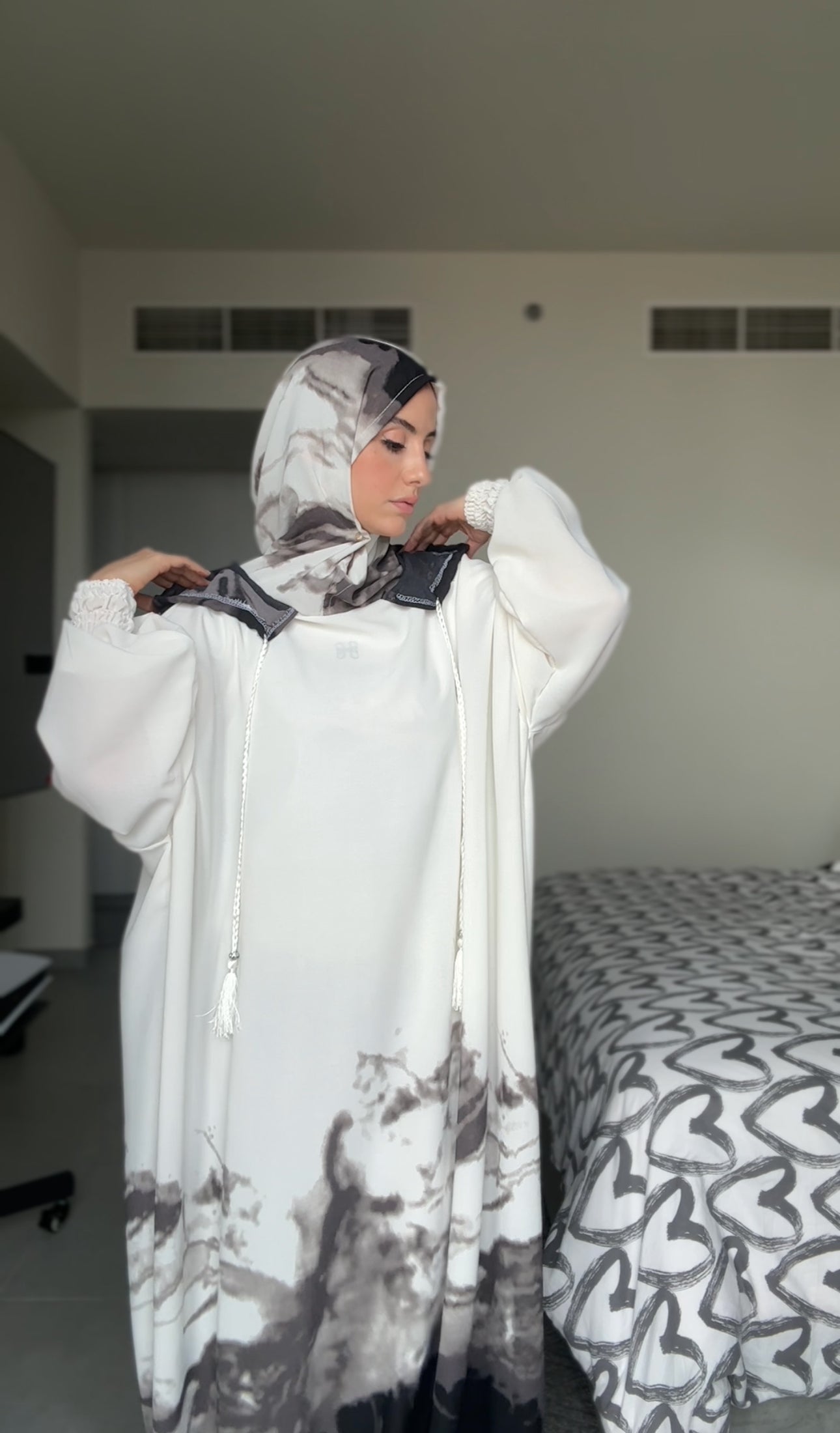 White burqa with gray dye