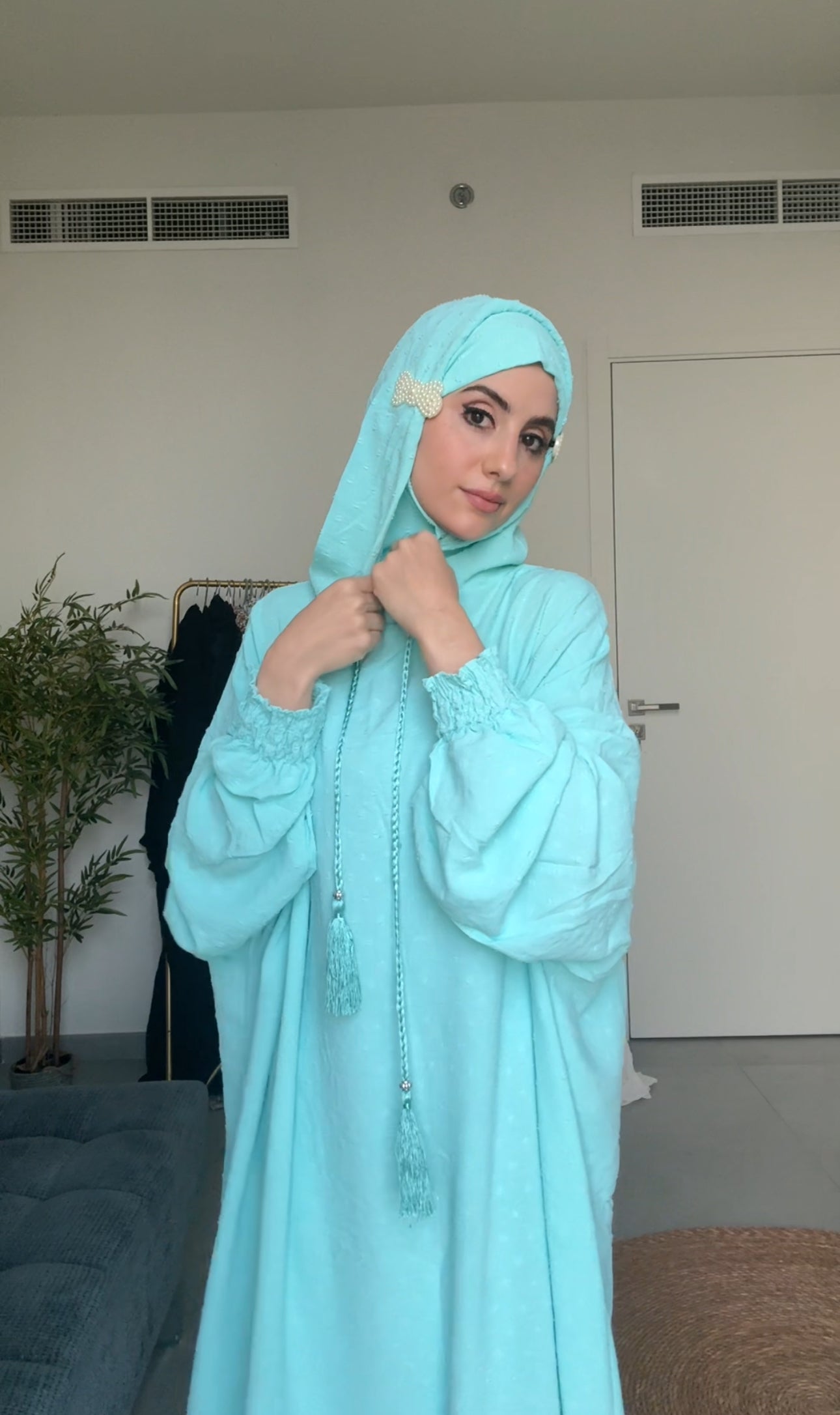 Bright blue burqa with blue dots