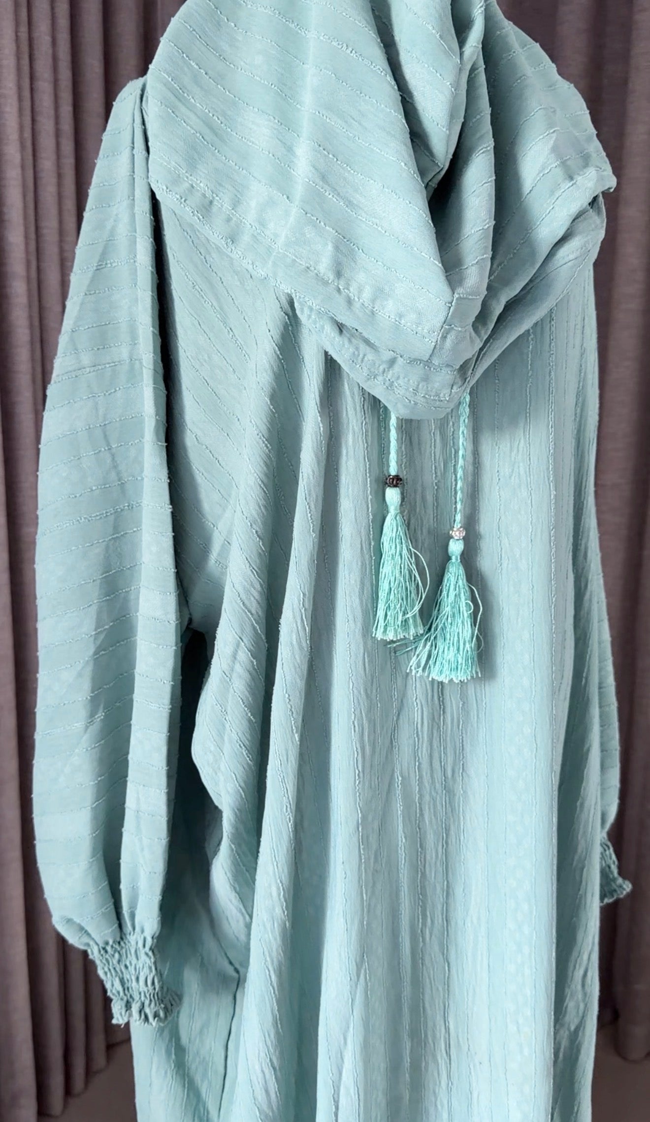 Light blue burqa with vertical lines
