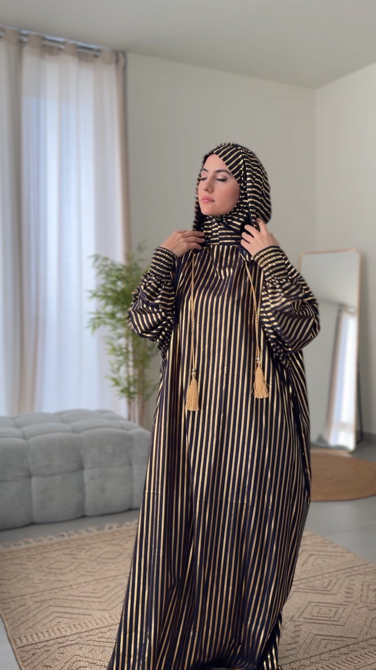 Dark navy burqa with thick gold vertical lines