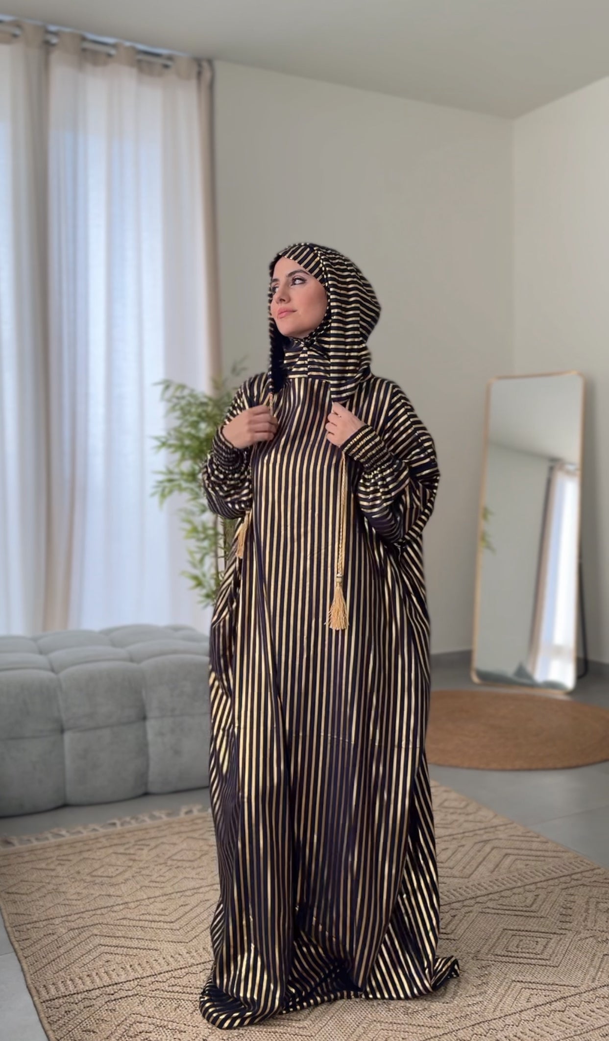 Dark navy burqa with thick gold vertical lines