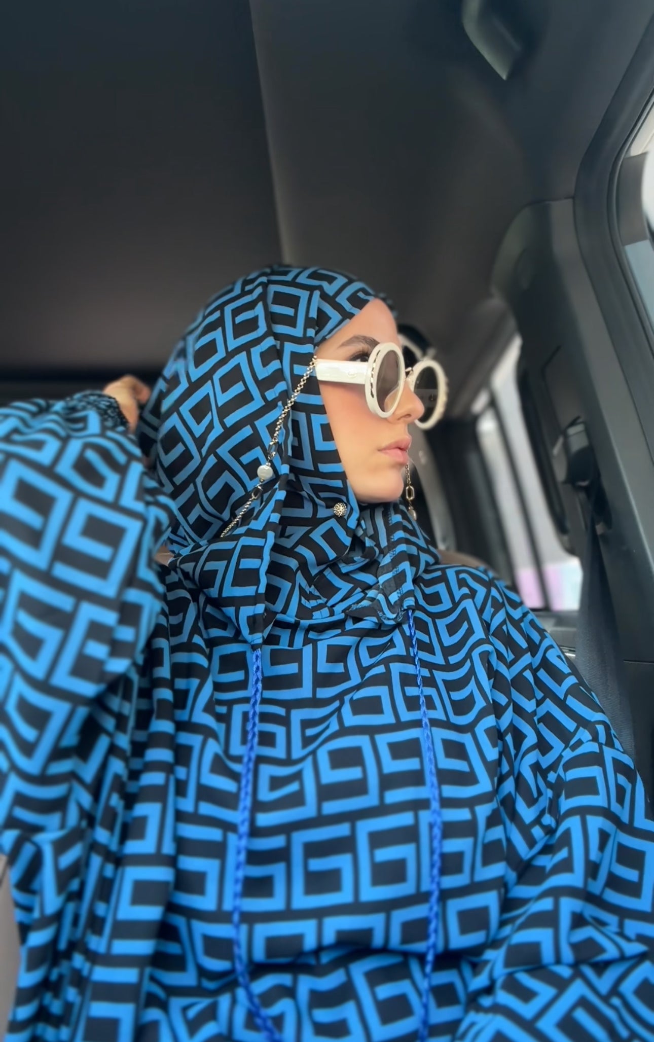 Blue burqa with black geometric lines