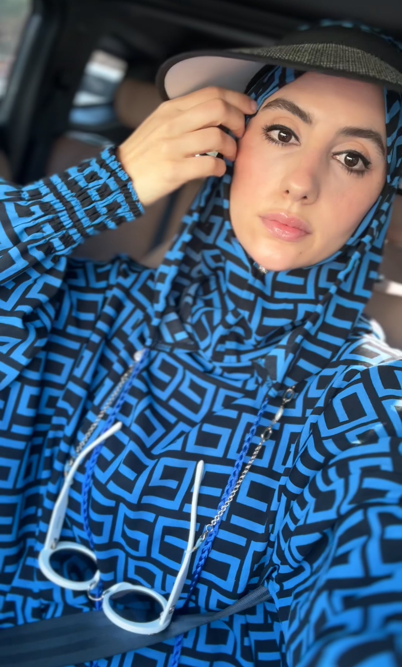 Blue burqa with black geometric lines