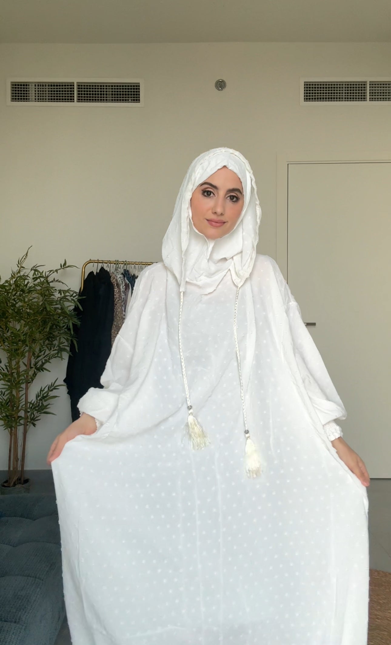 White burqa with white dots