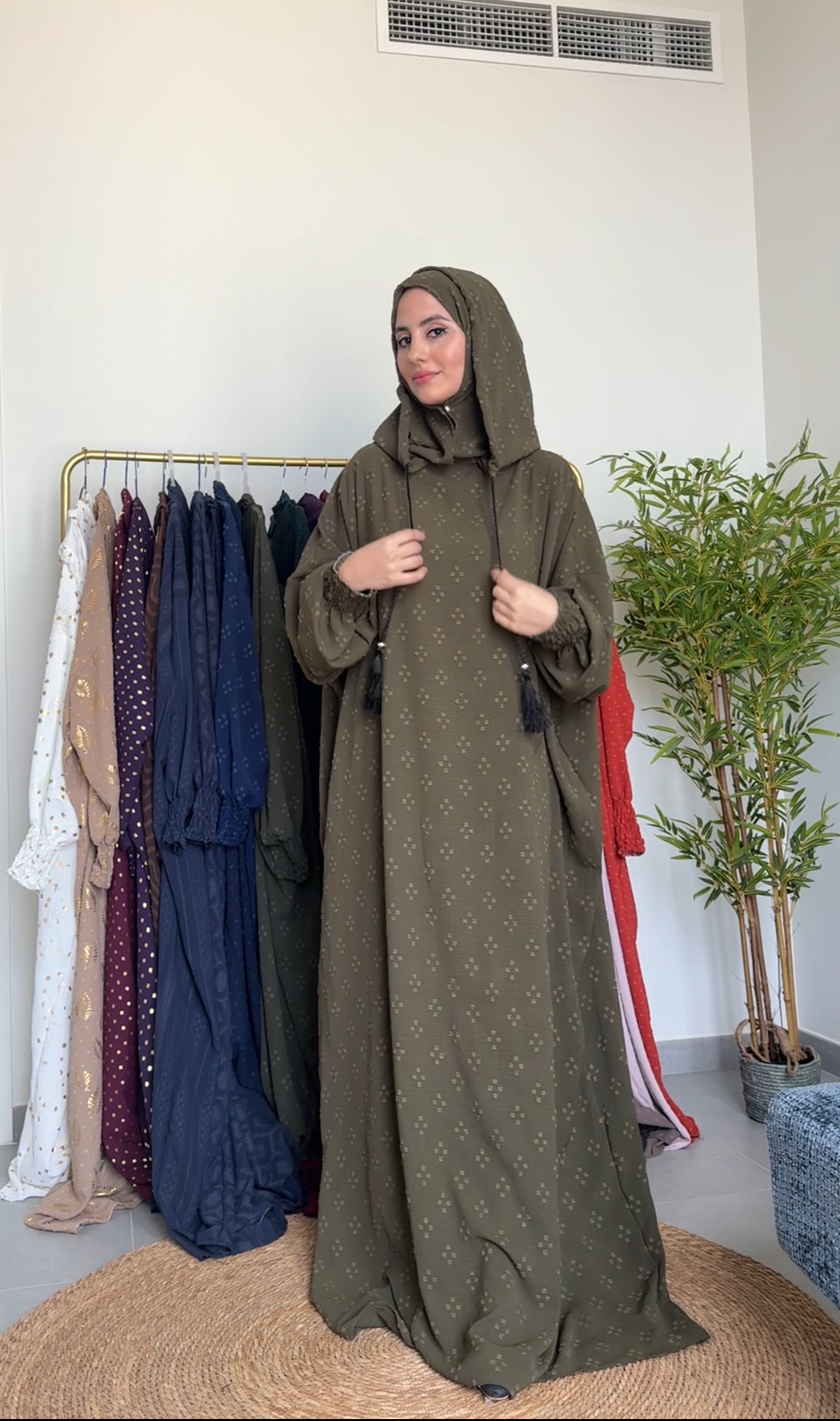 Olive green burqa with four dots