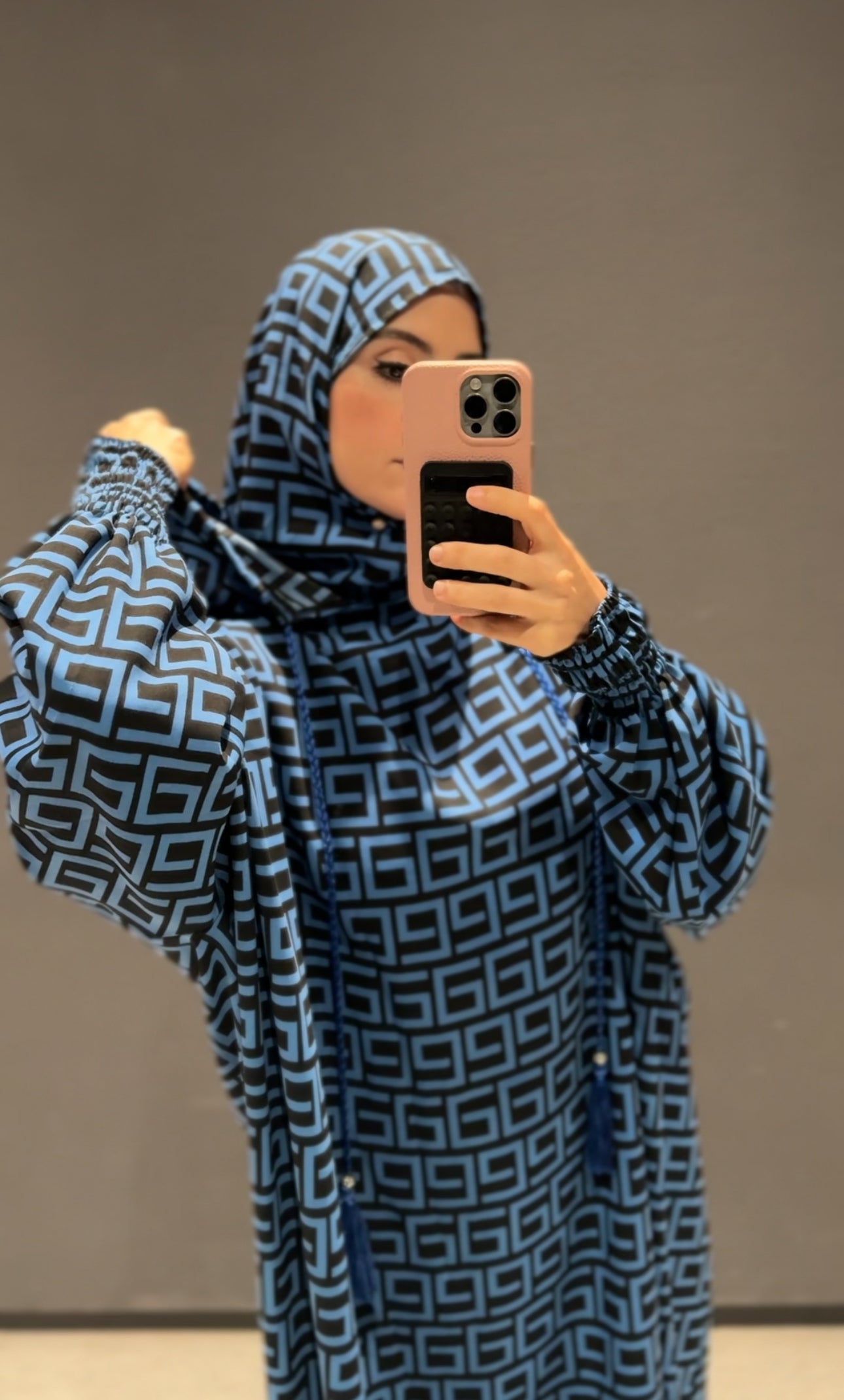 Blue burqa with black geometric lines