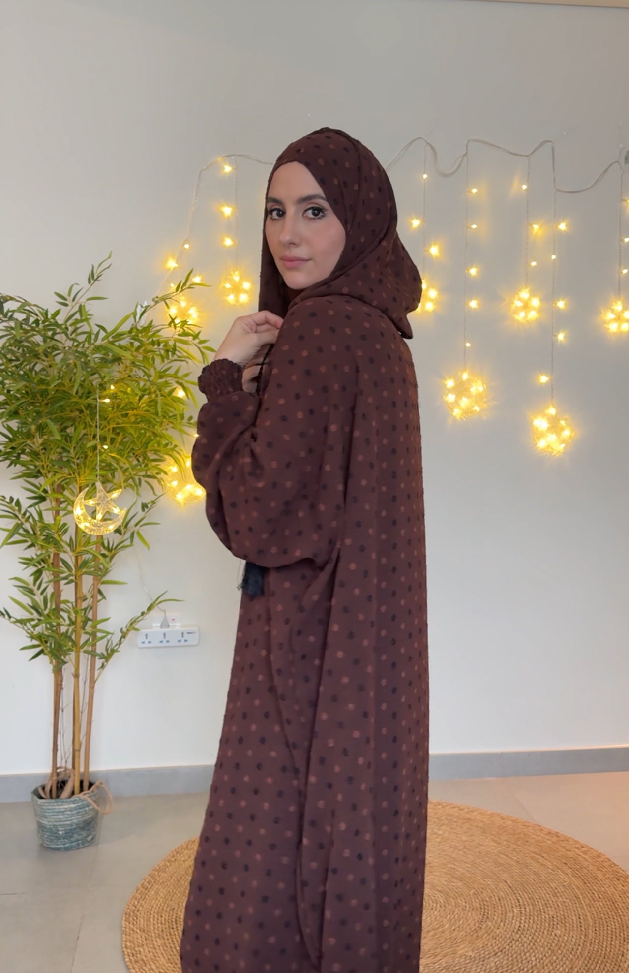 Dark brown burqa with black dots