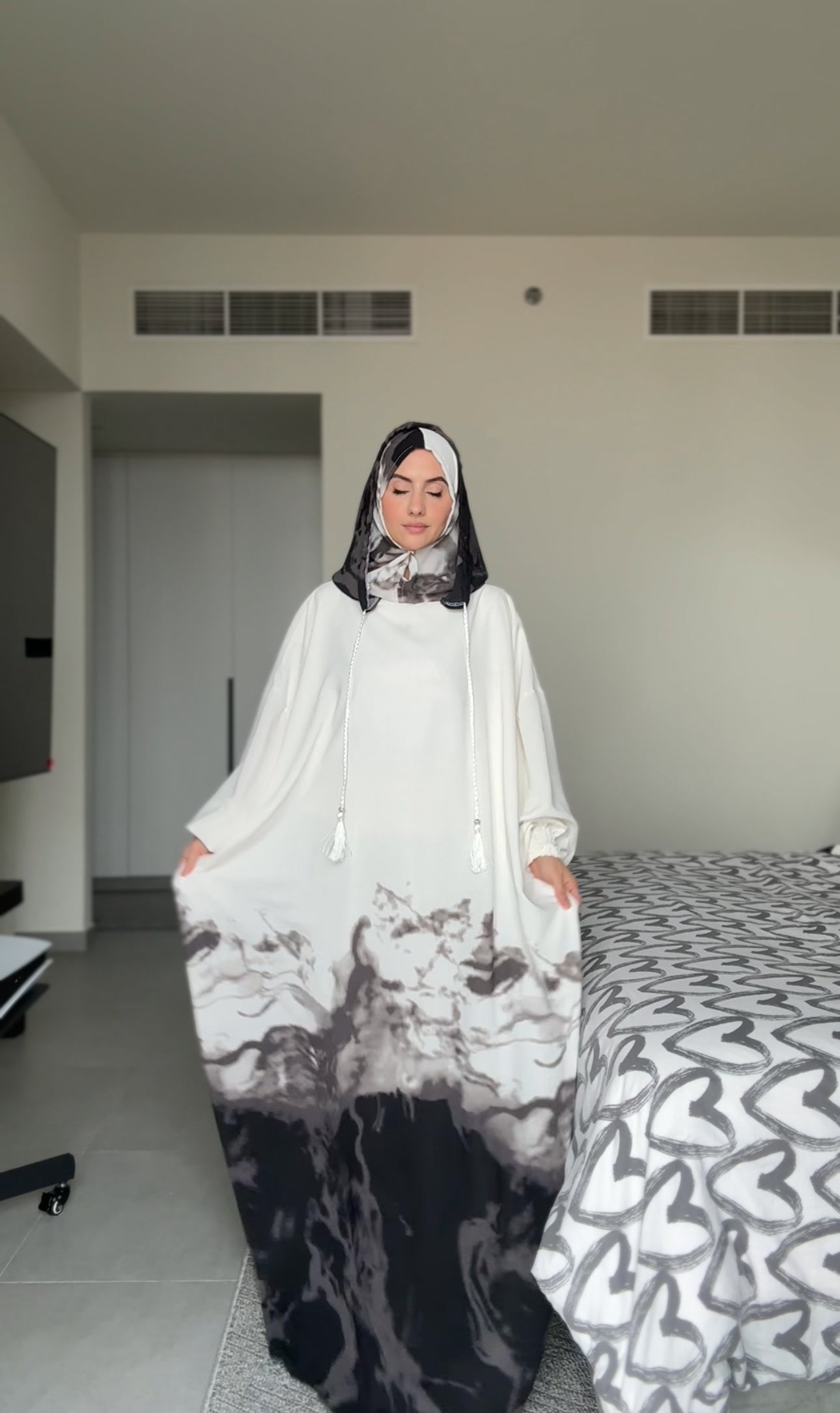 White burqa with gray dye