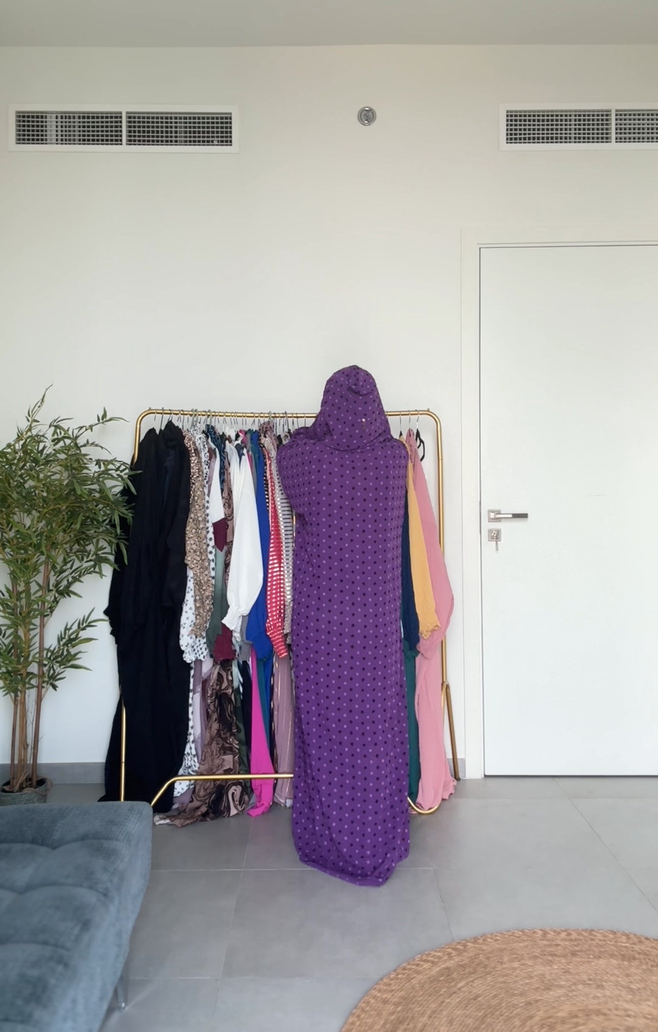 Bright purple burqa with black dots