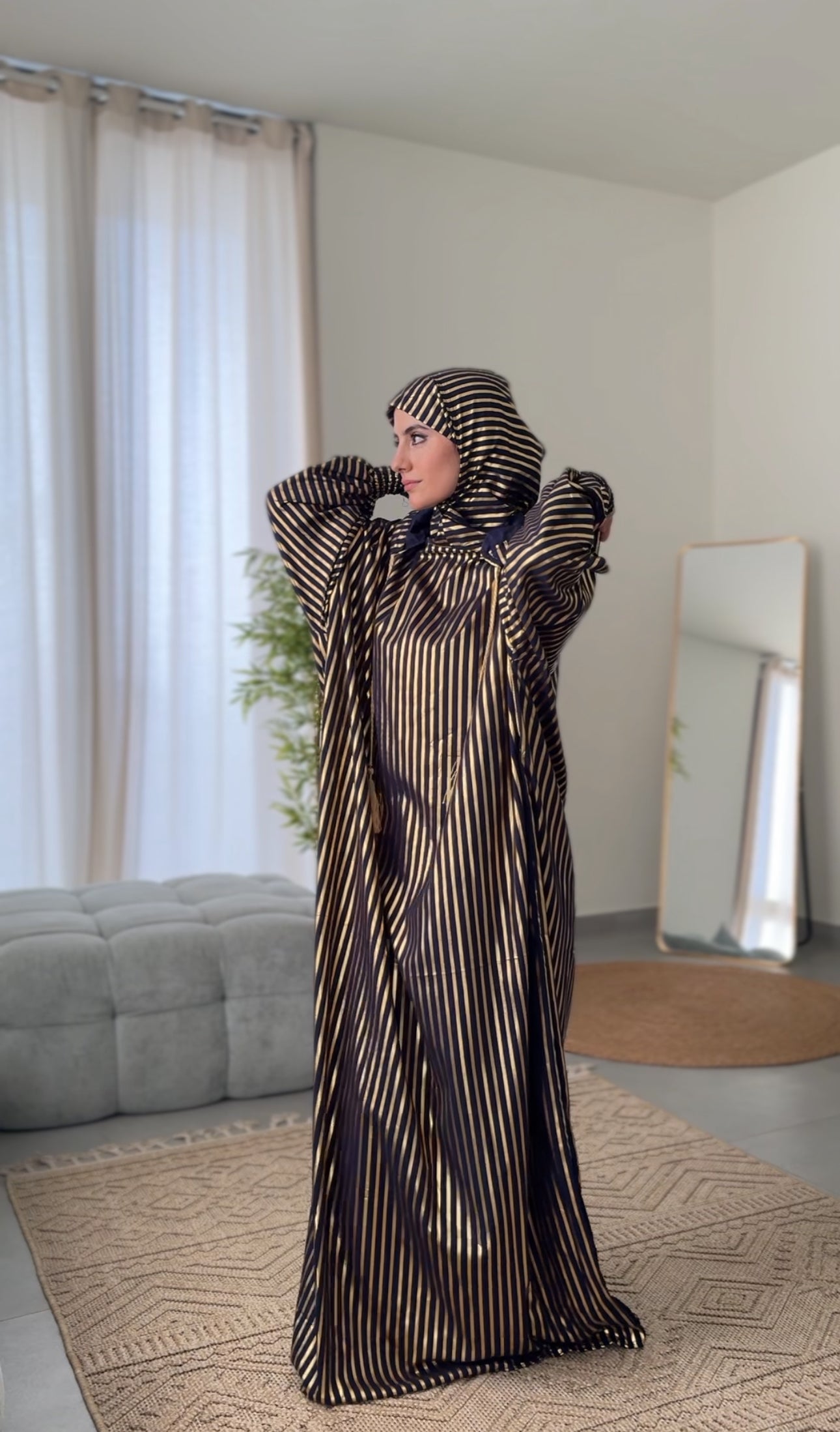 Dark navy burqa with thick gold vertical lines