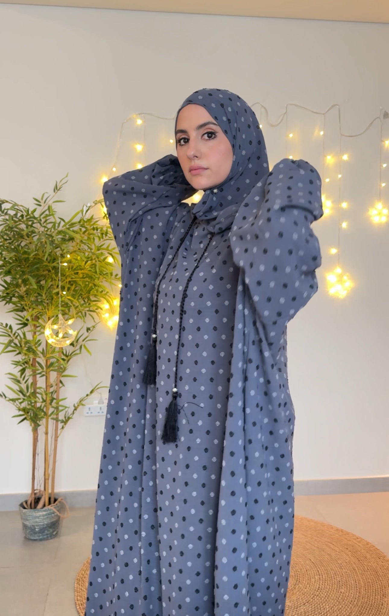 Gray burqa with black dots