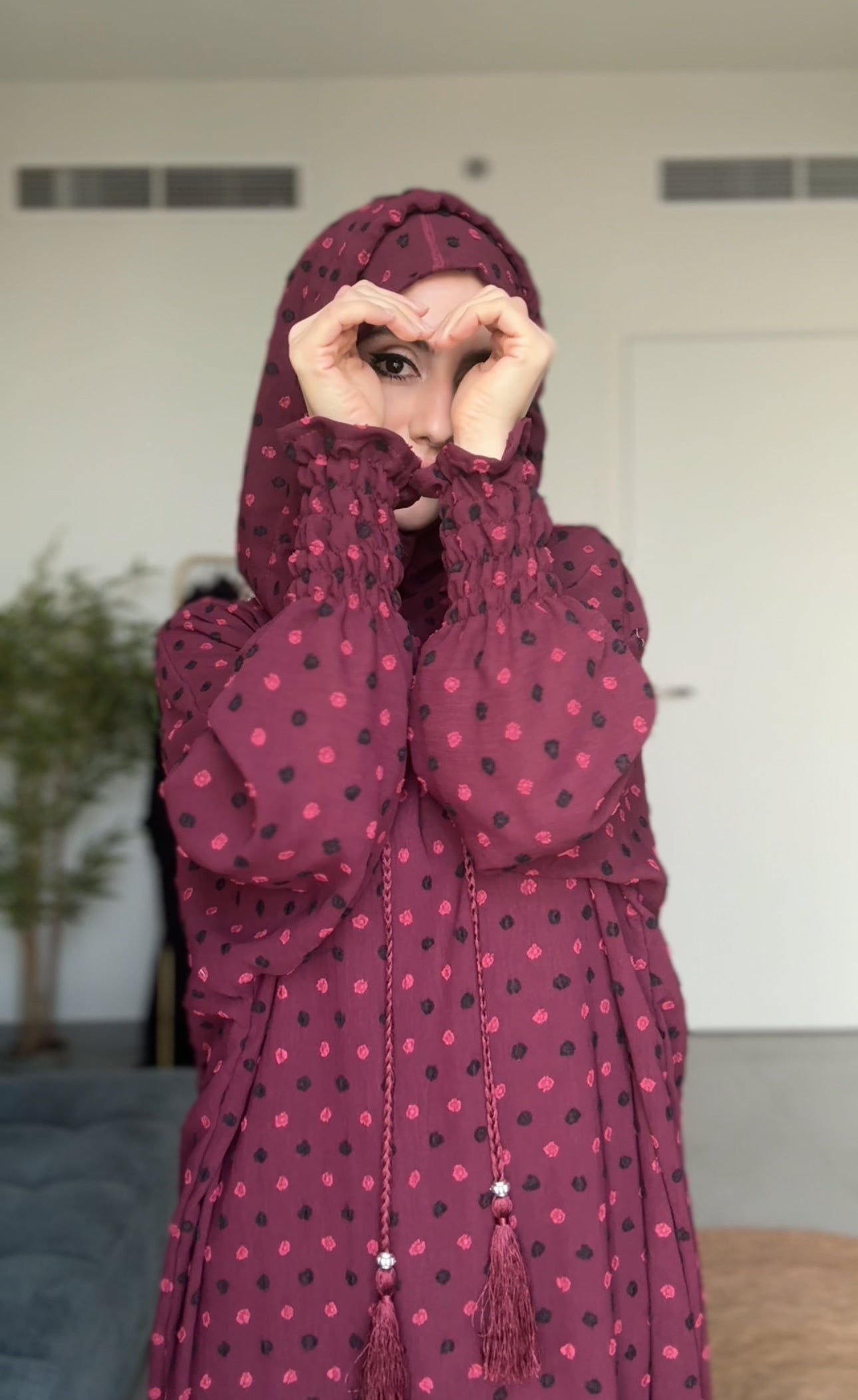 Maroon burqa with black dots