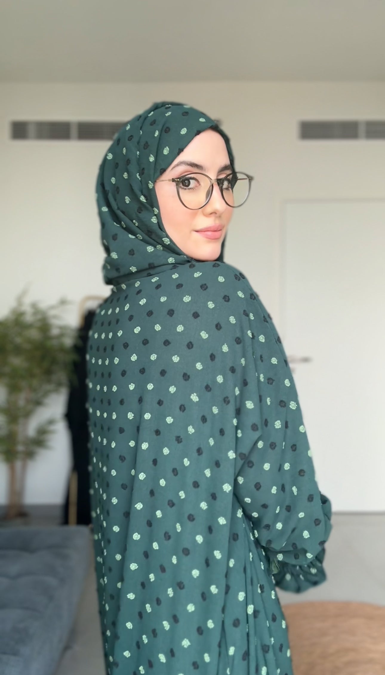 Emerald green burqa with black dots