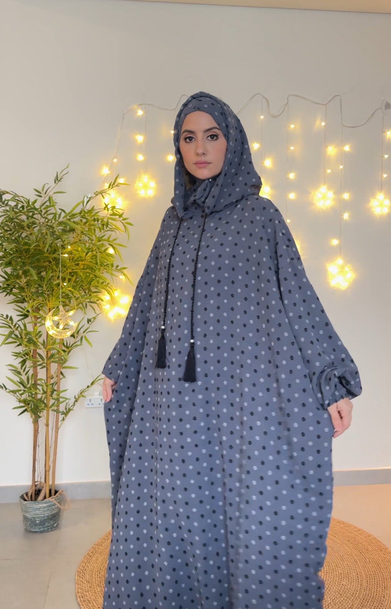 Gray burqa with black dots