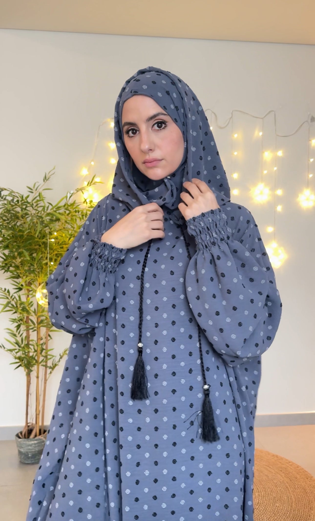 Gray burqa with black dots