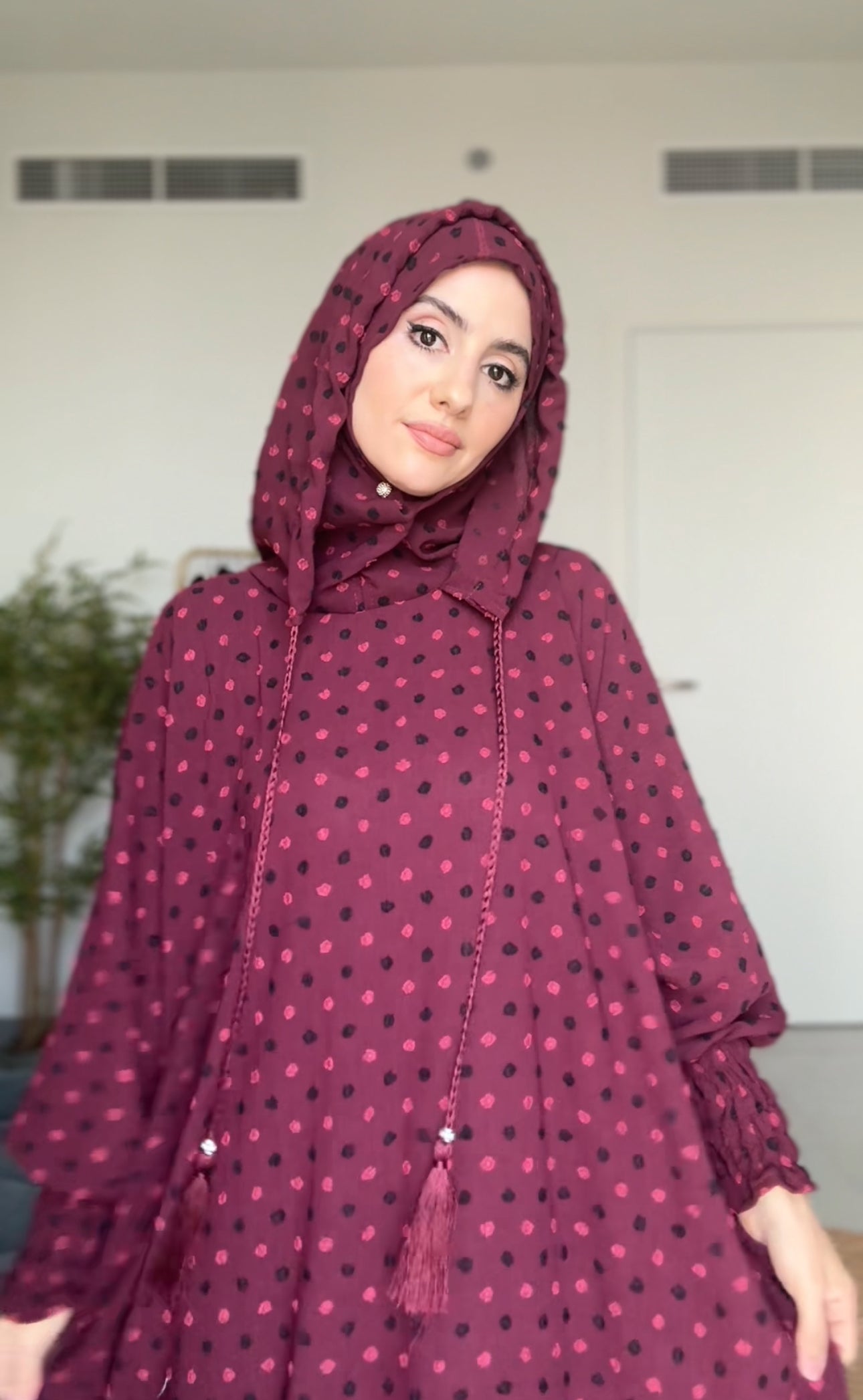 Maroon burqa with black dots