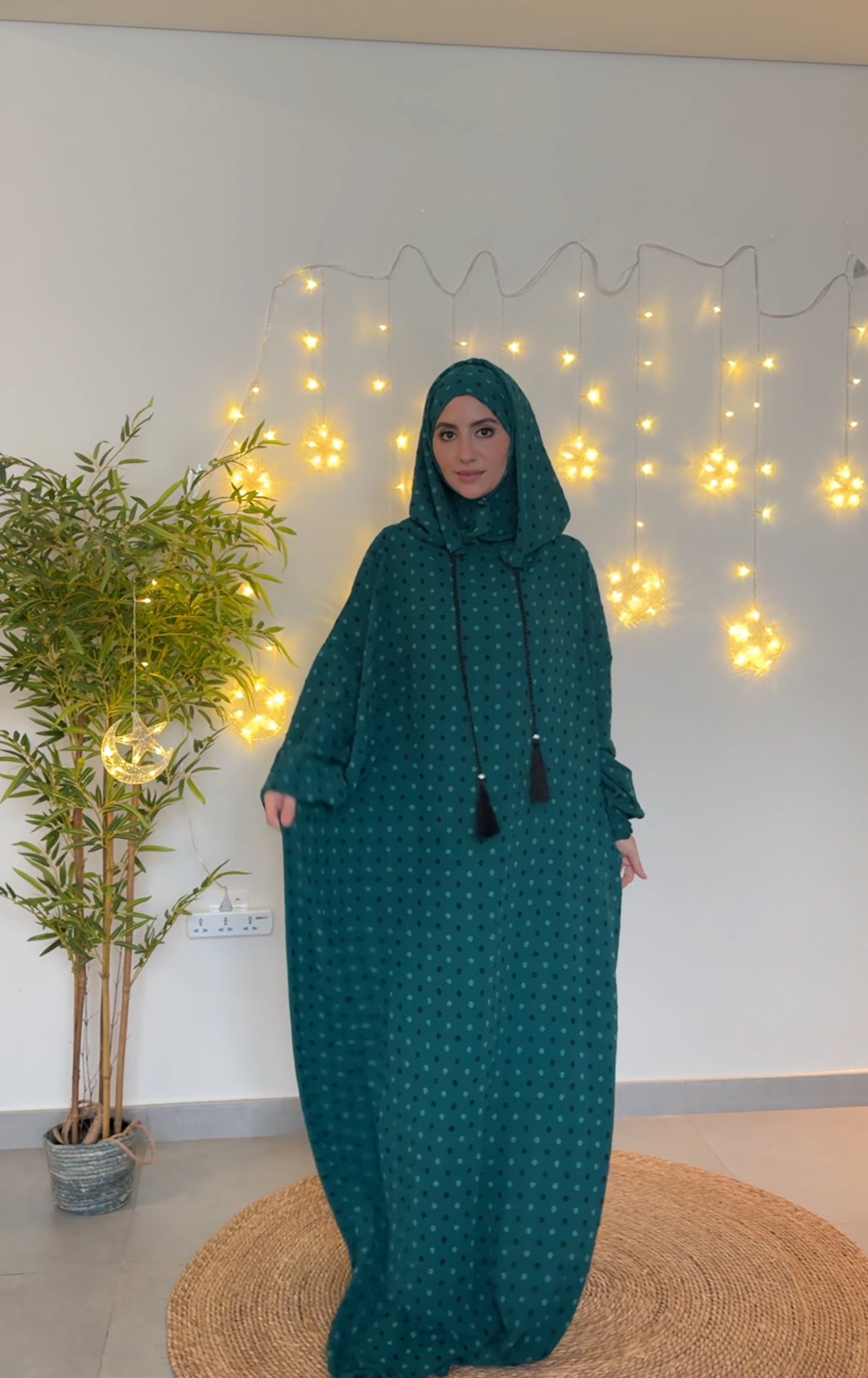 Emerald green burqa with black dots