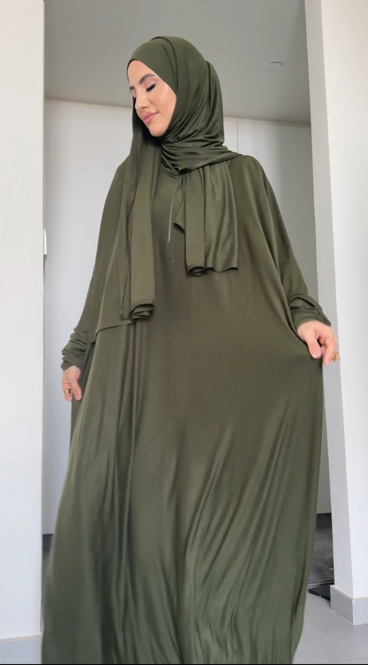 Army green stretch fabric burqa with zip and attached scarf